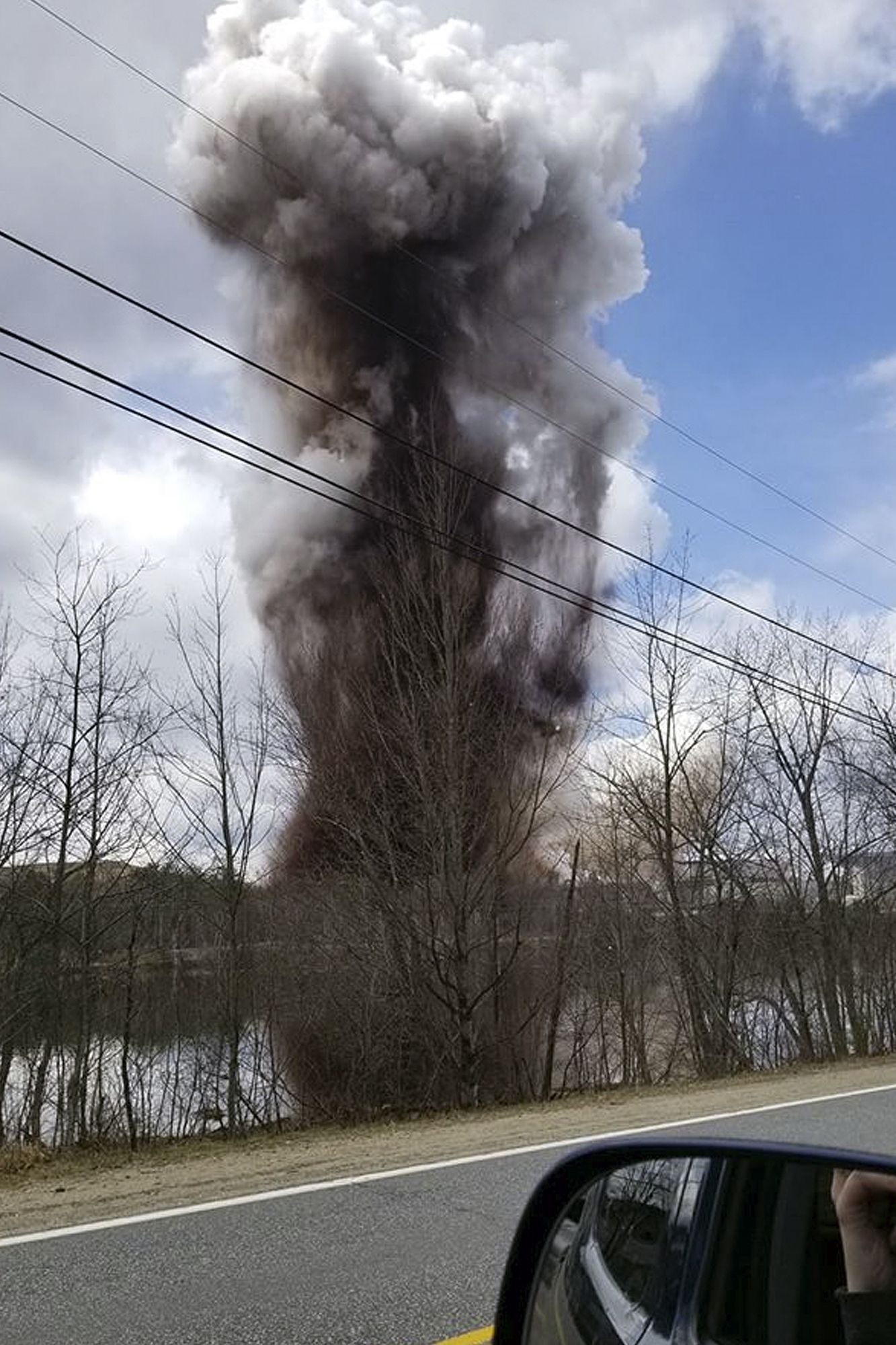 Smoke rises from an explosion at the Androscoggin Mill in Jay on April 15.