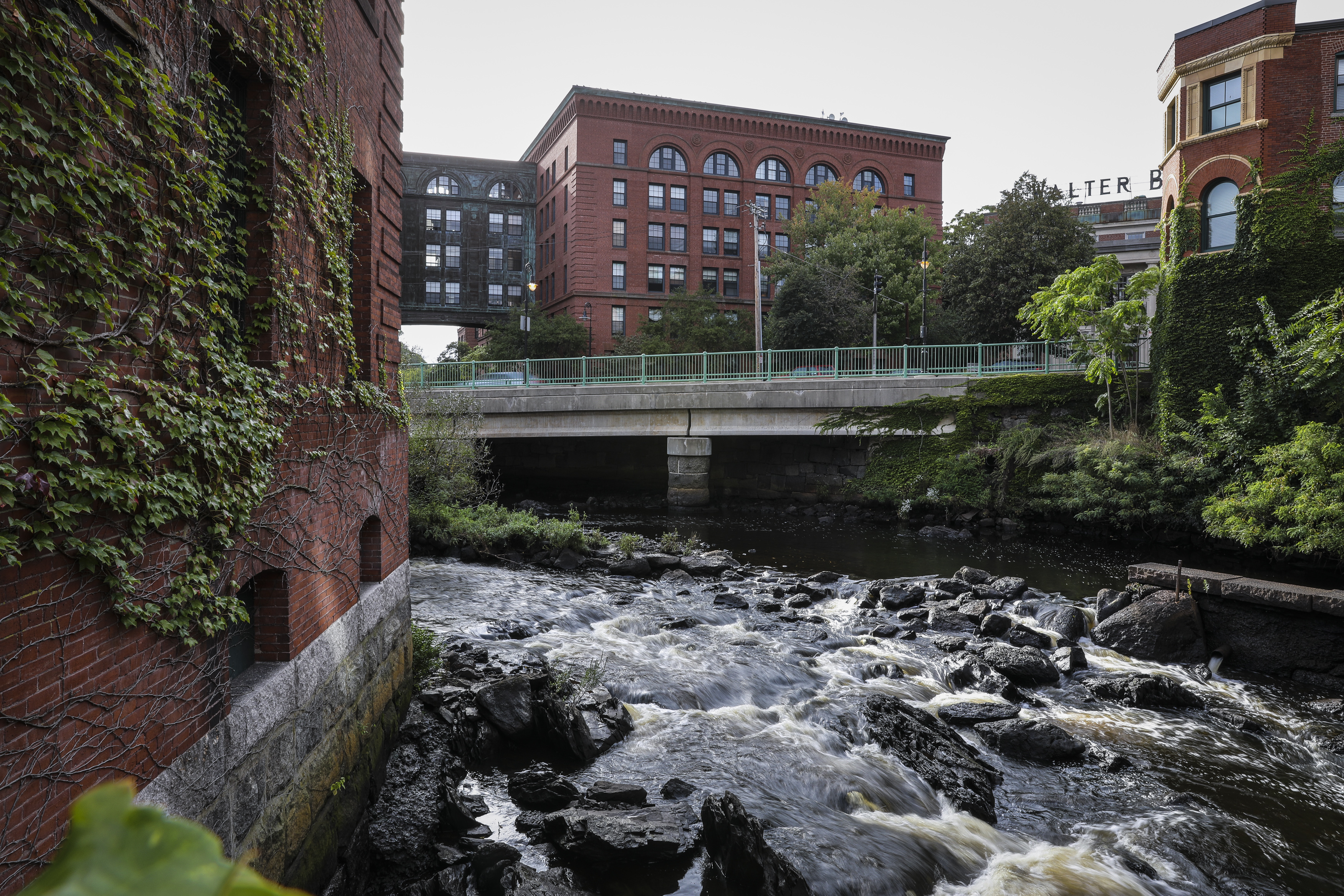 The Neponset River winds through lofts in Lower Mills.