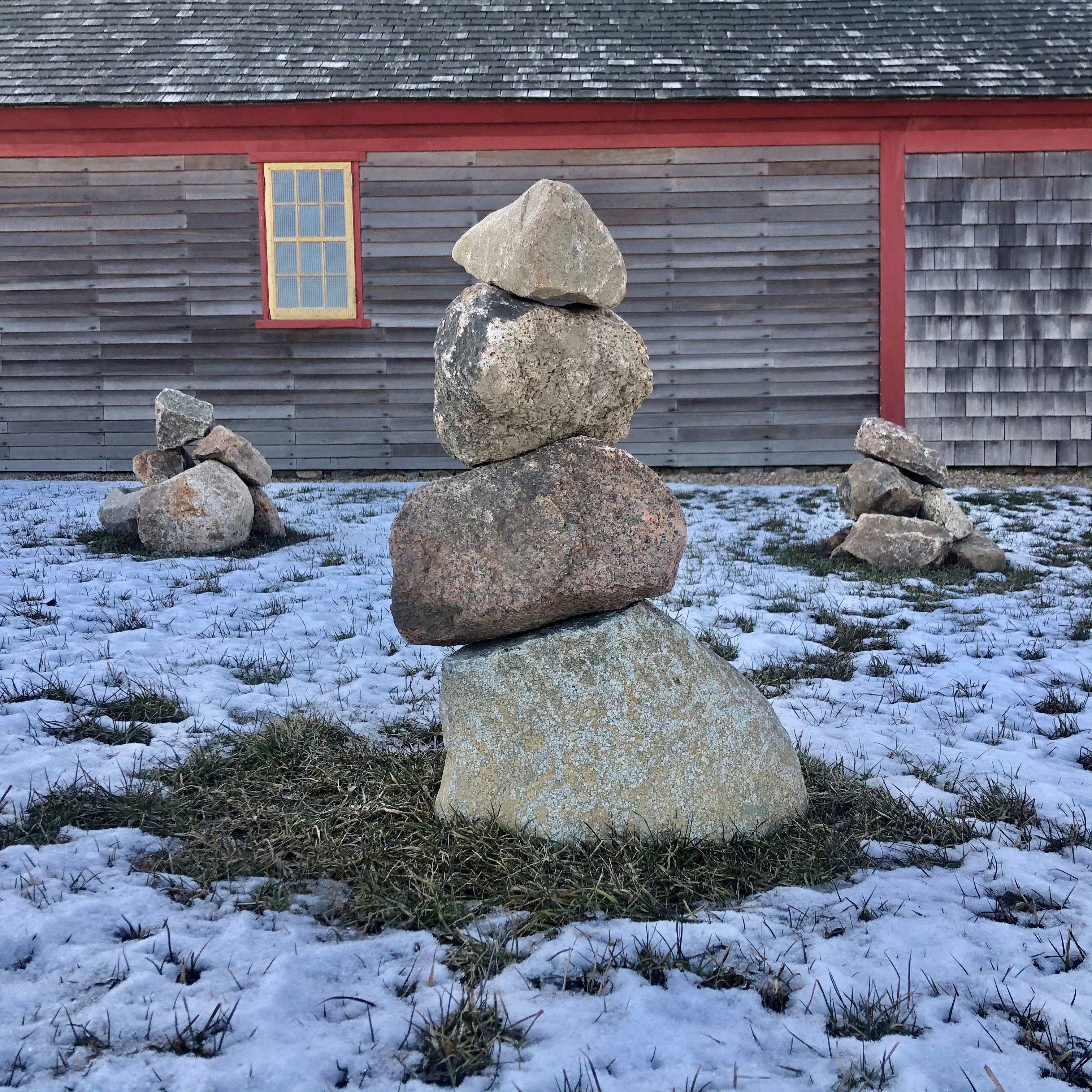 Volunteers will be building memorial cairns on March 5-6 as part of the Cape Ann Museum COVID-19 Memorial. The cairns pictured here were built by CAM staff to help guide the volunteers.