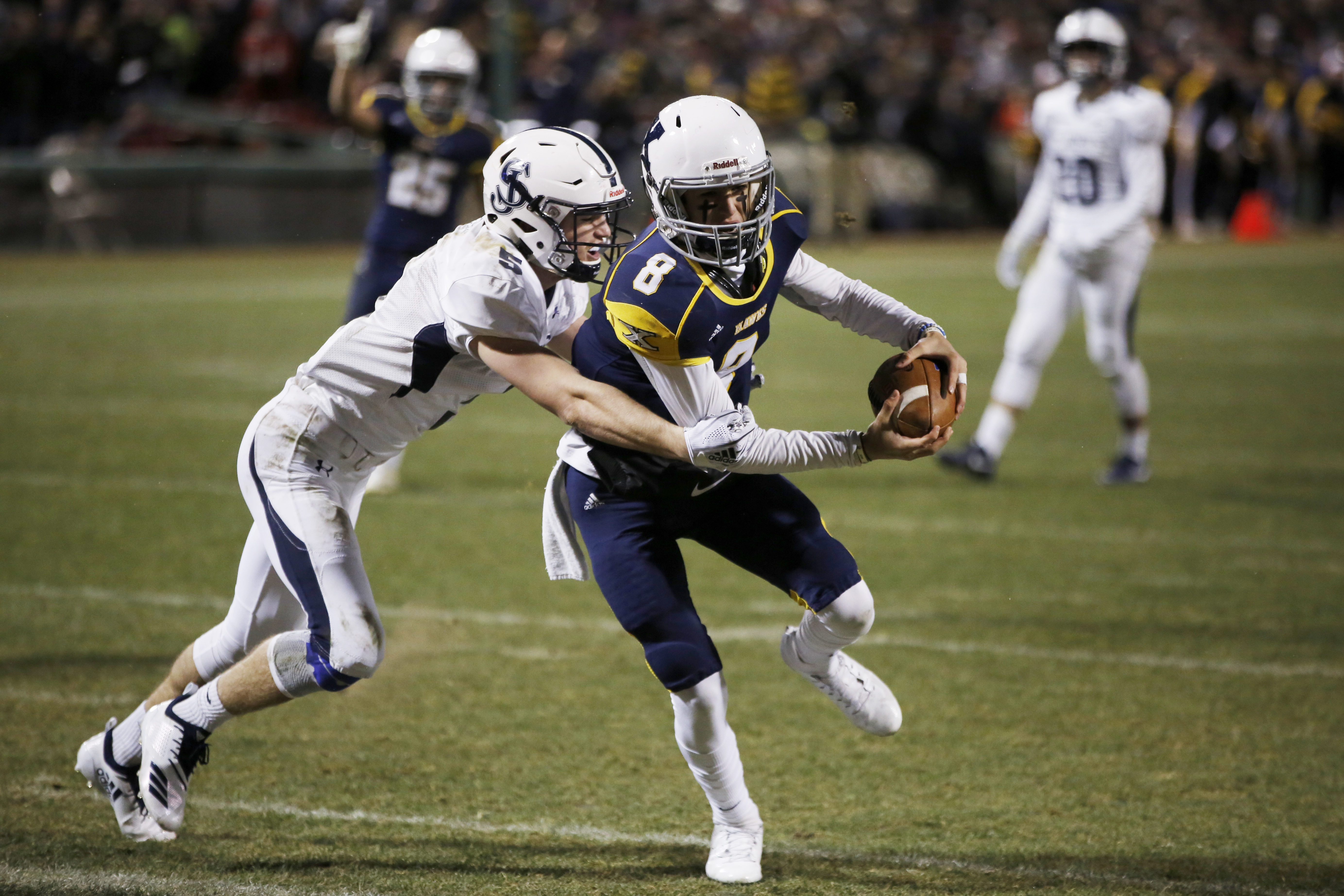 Michael Berluti (right) scored against St. John's Prep during the Catholic Conference title at Fenway Park in 2018.