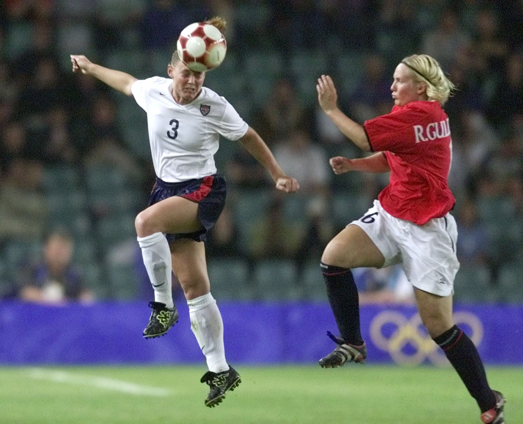 Christie Pearce (left) won two Women's World Cup titles and three Olympic gold medals during her career.