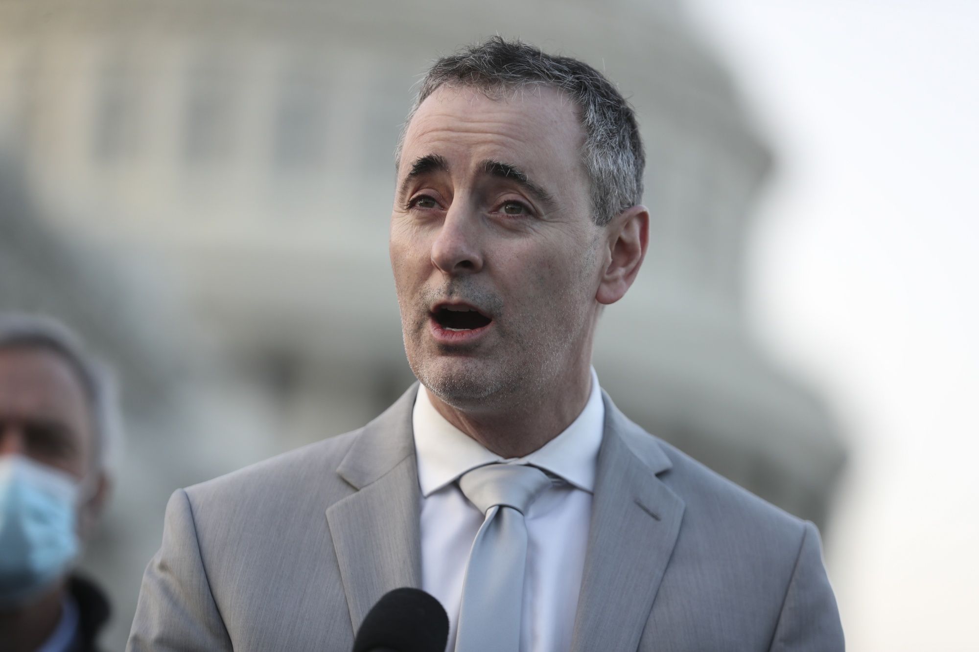 Representative Brian Fitzpatrick spoke during a news conference with members of the bipartisan Problem Solvers Caucus at the US Capitol in December.