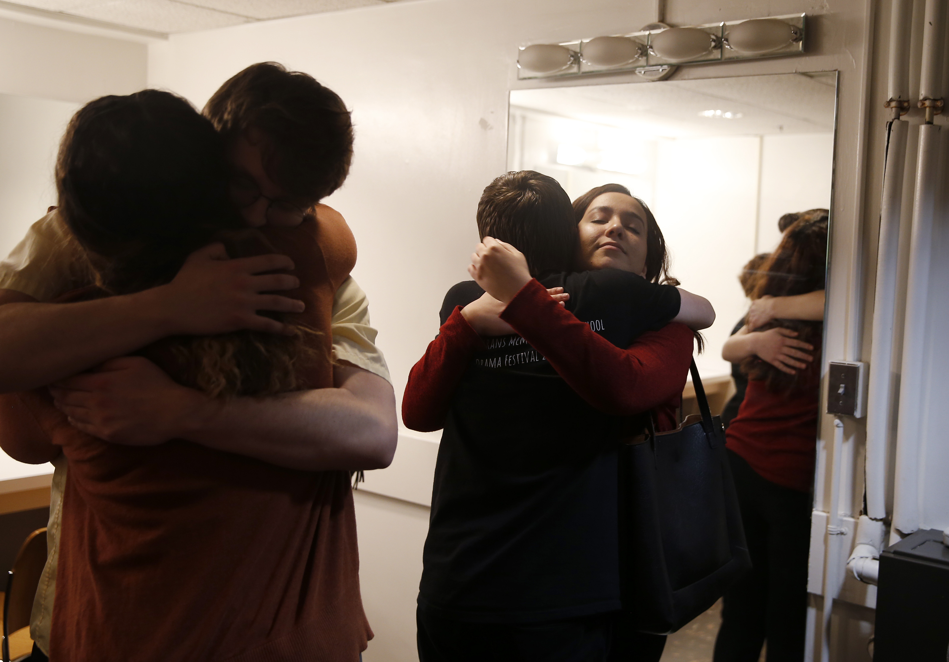 Moments before their final performance at the state drama festival, Deb embraced her fellow cast members.