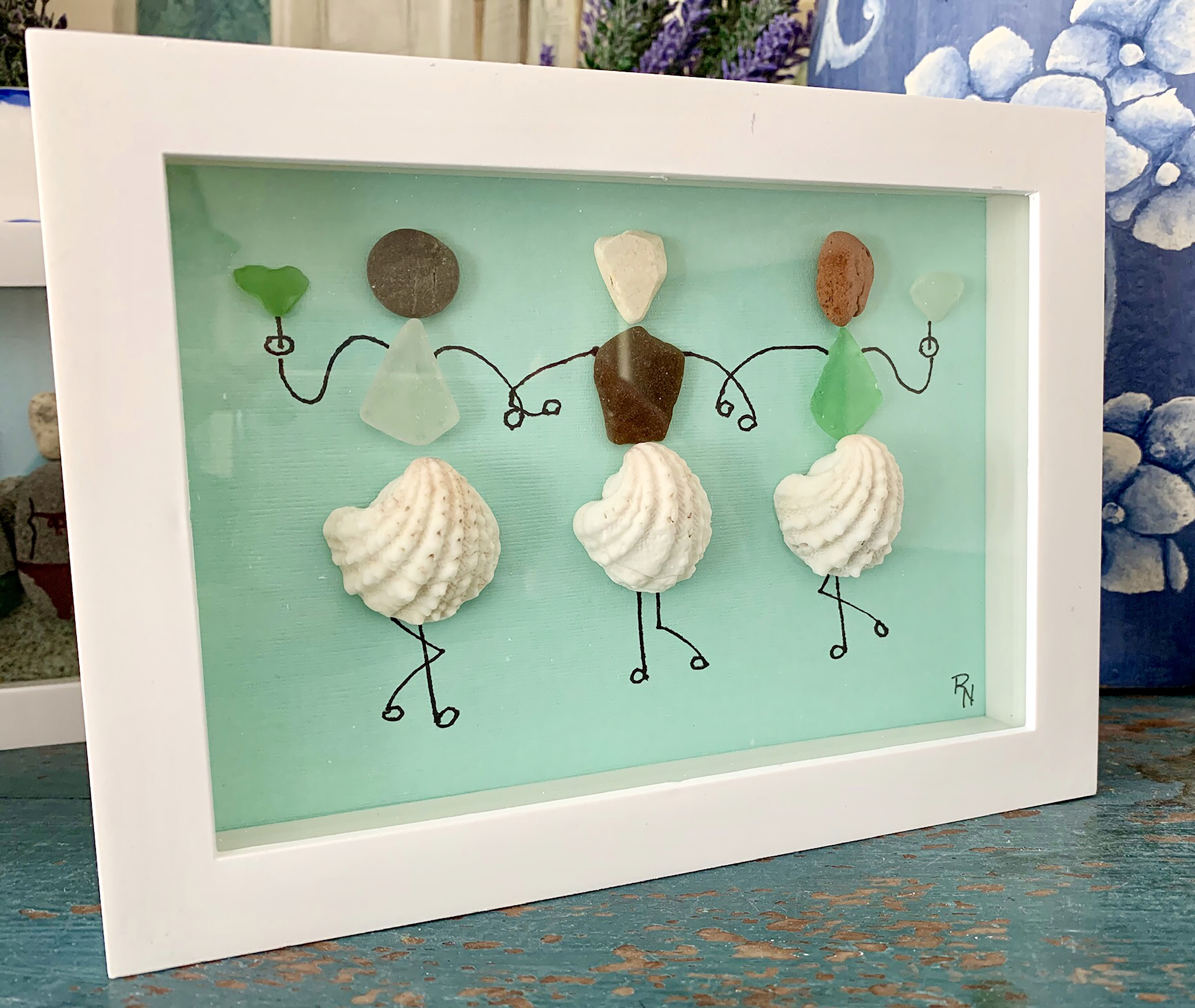Carol Lee's Cottage in Rockport sells artwork made by Robin Nichols from sea glass and shells collected on Rockport beaches.
