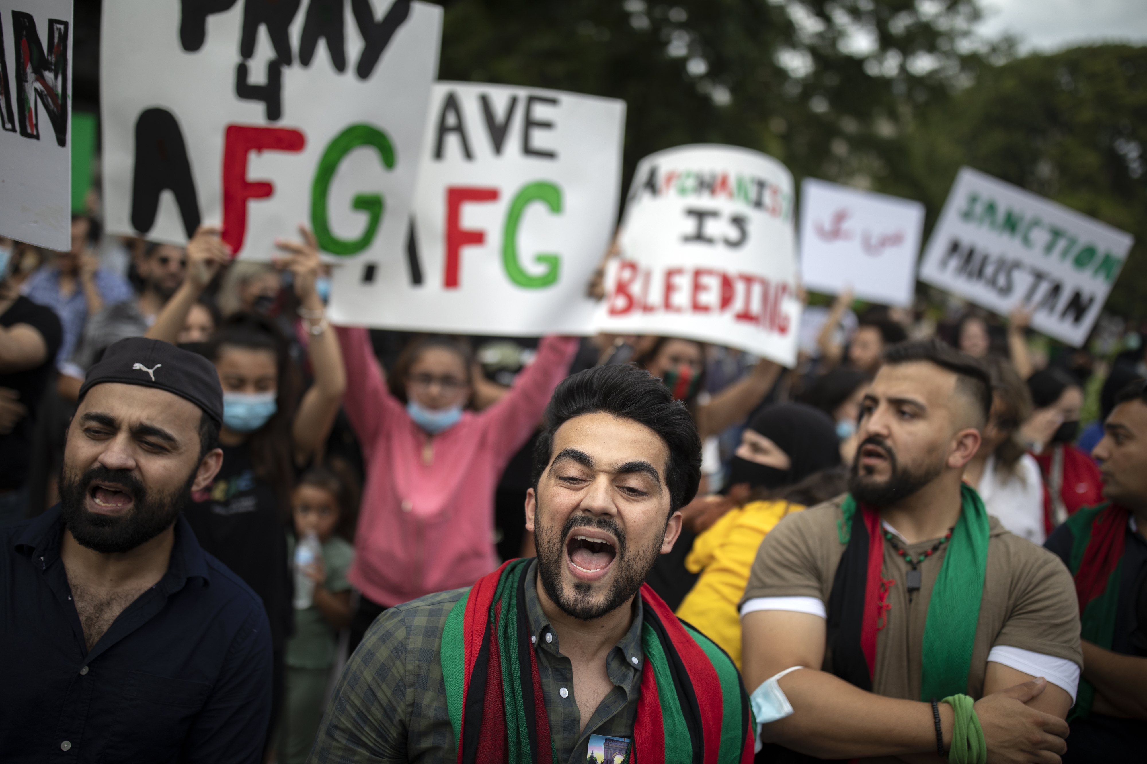 Demonstrators protested the United States' military pullout of Afghanistan as the Taliban moved into Kabul, at the White House in Washington, Aug. 15, 2021.