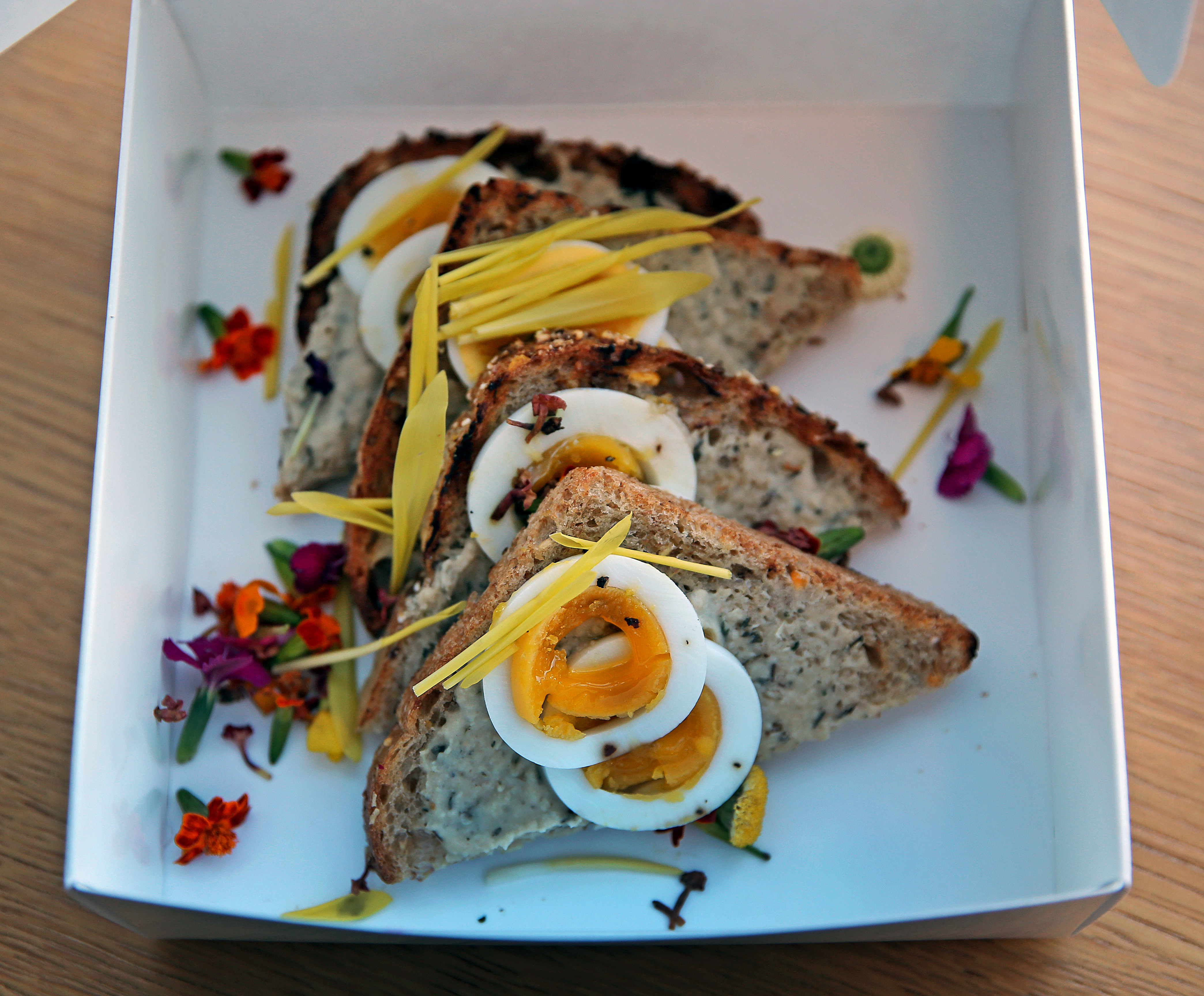 A boxed fresh meal from the Alchemista food locker.