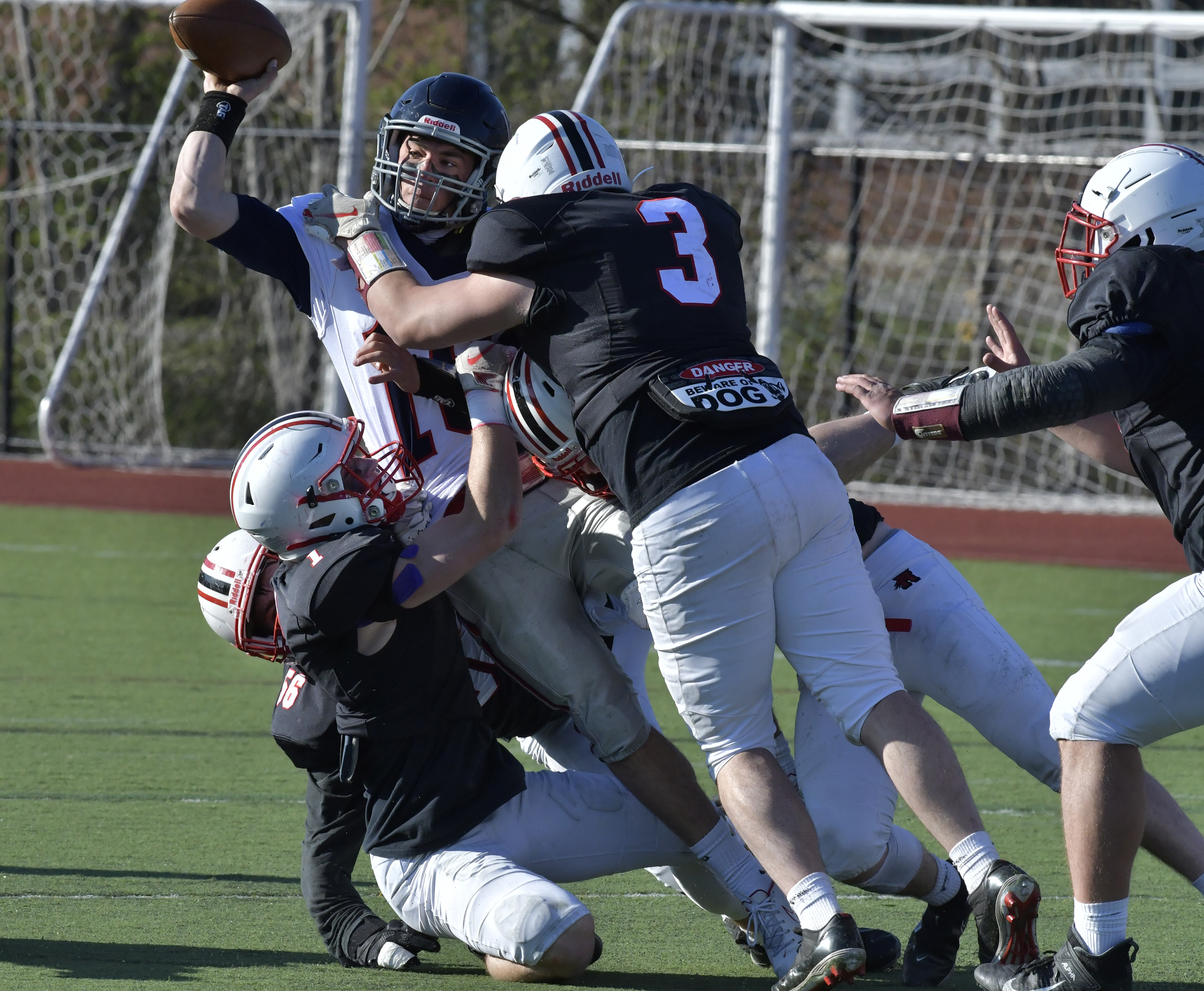Lincoln-Sudbury quarterback Riley O'Connell struggled with the Reading defense on this play, but still managed to throw for a pair of touchdowns and run for two more.