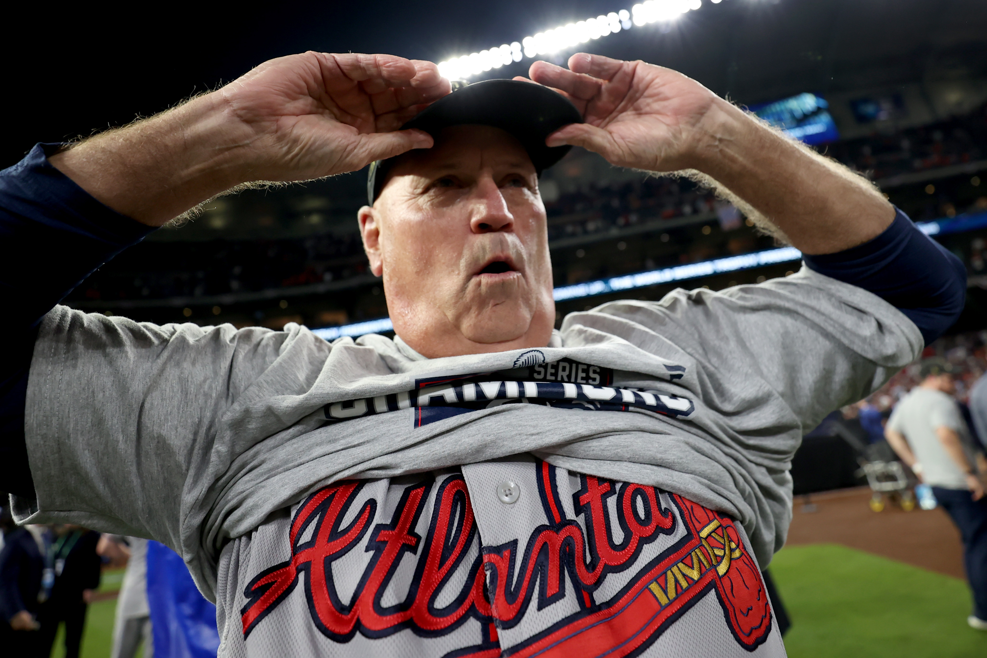 Brian Snitker leads Atlanta Braves' locker room celebration after