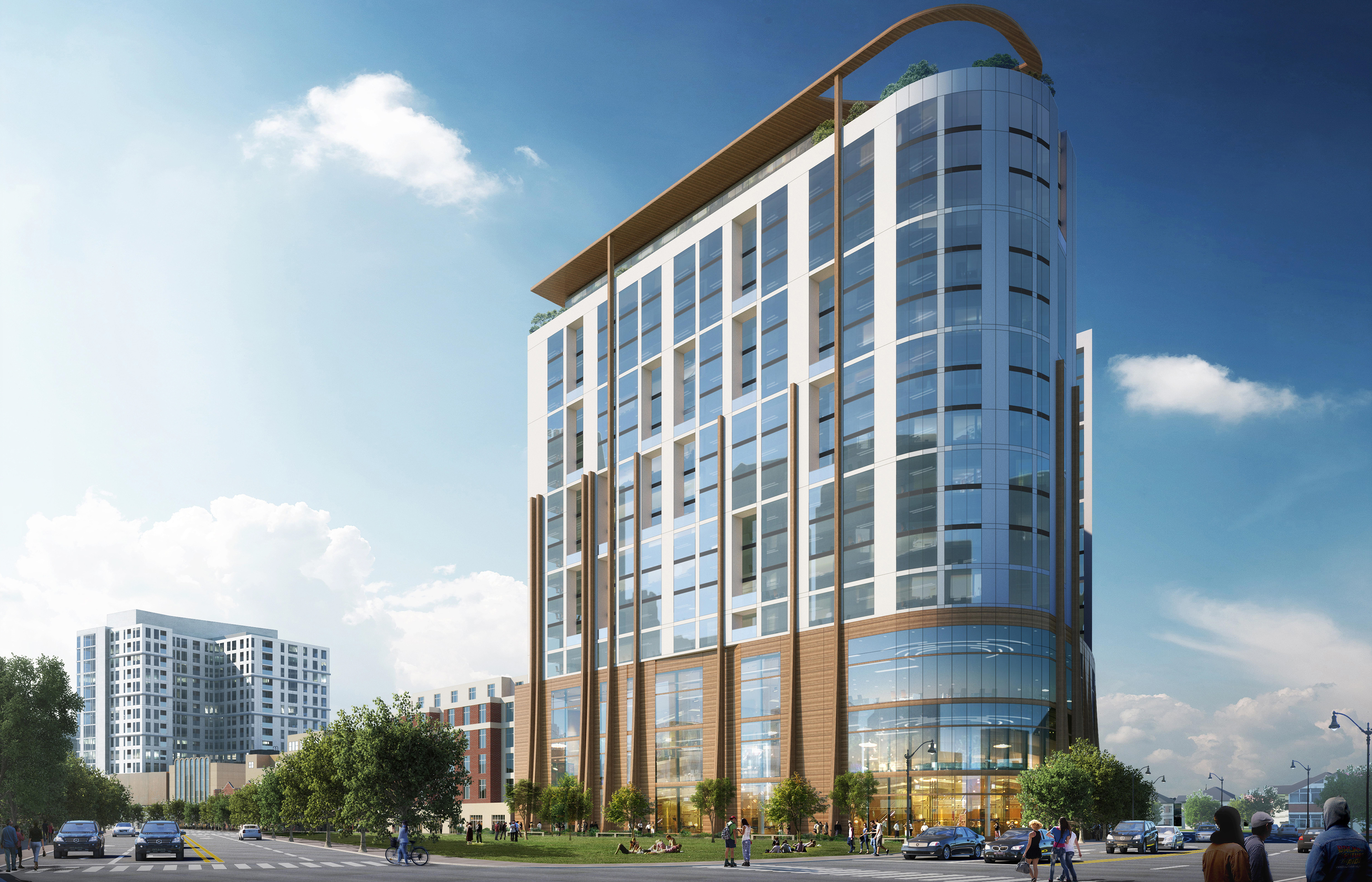 A street-level rendering depicts the plan for a new performing arts center in Quincy, with a residential high-rise project on top.