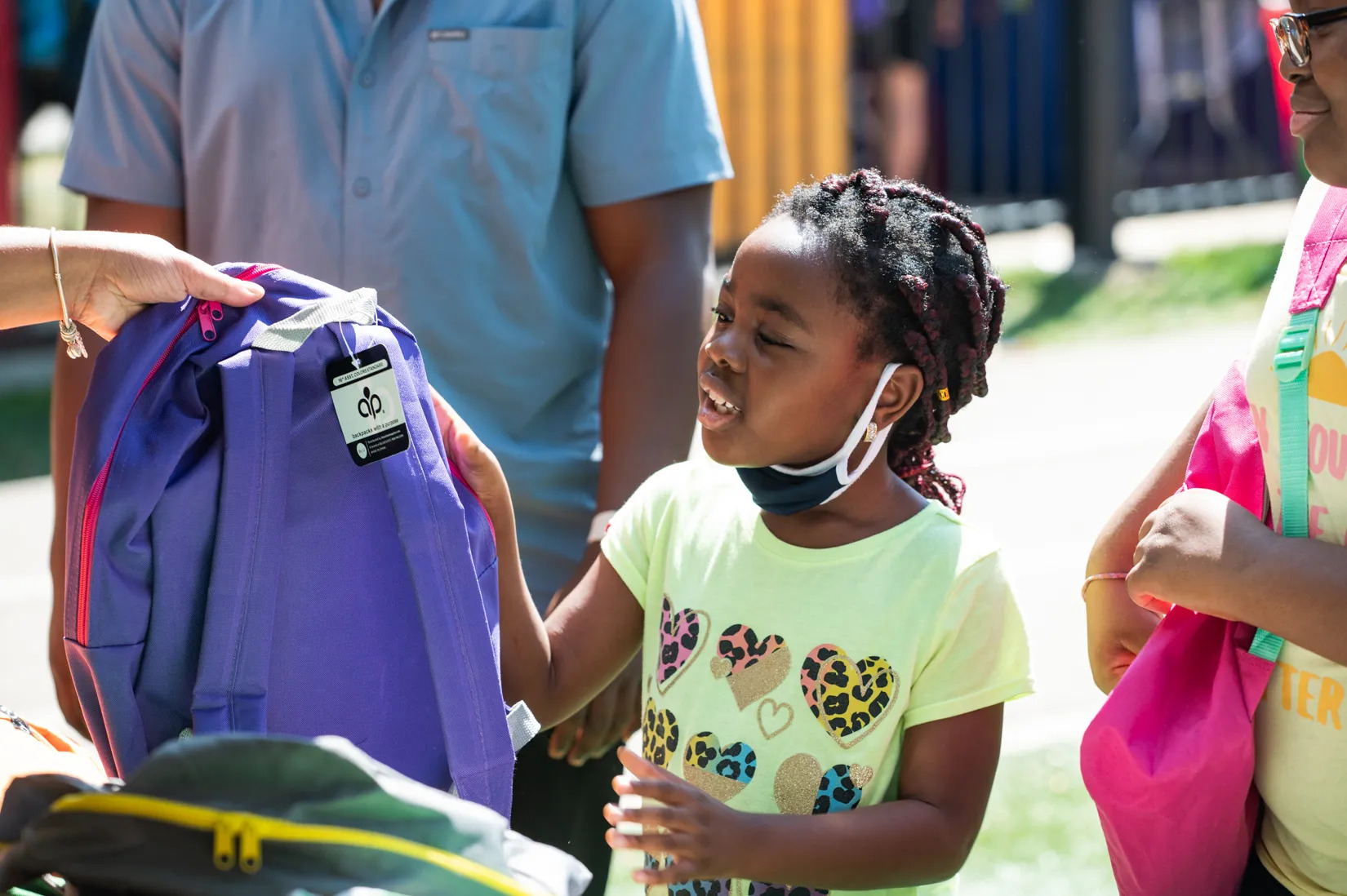 Back-to-school event gives students free haircuts and backpacks