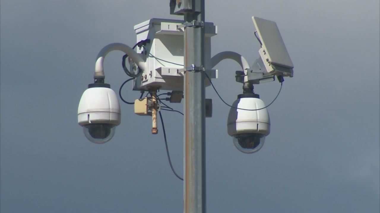 image of cameras and audio receivers mounted on a pole. 