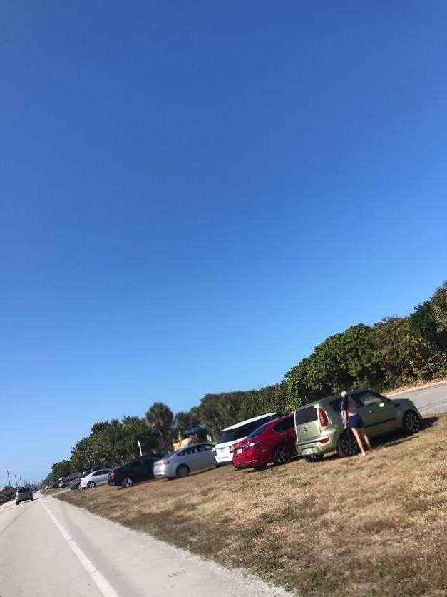 Cars line Highway A1A as beach parking lots close in Brevard County WDBO