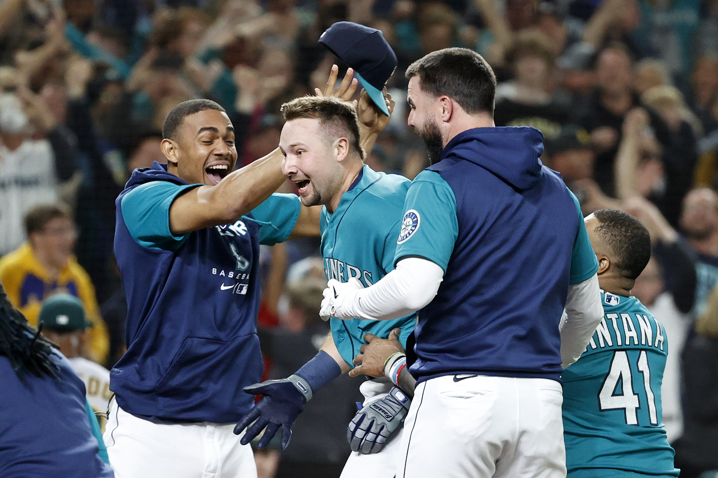 PHOTOS: Mariners clinch playoff spot after win over Athletics – KIRO 7 News  Seattle