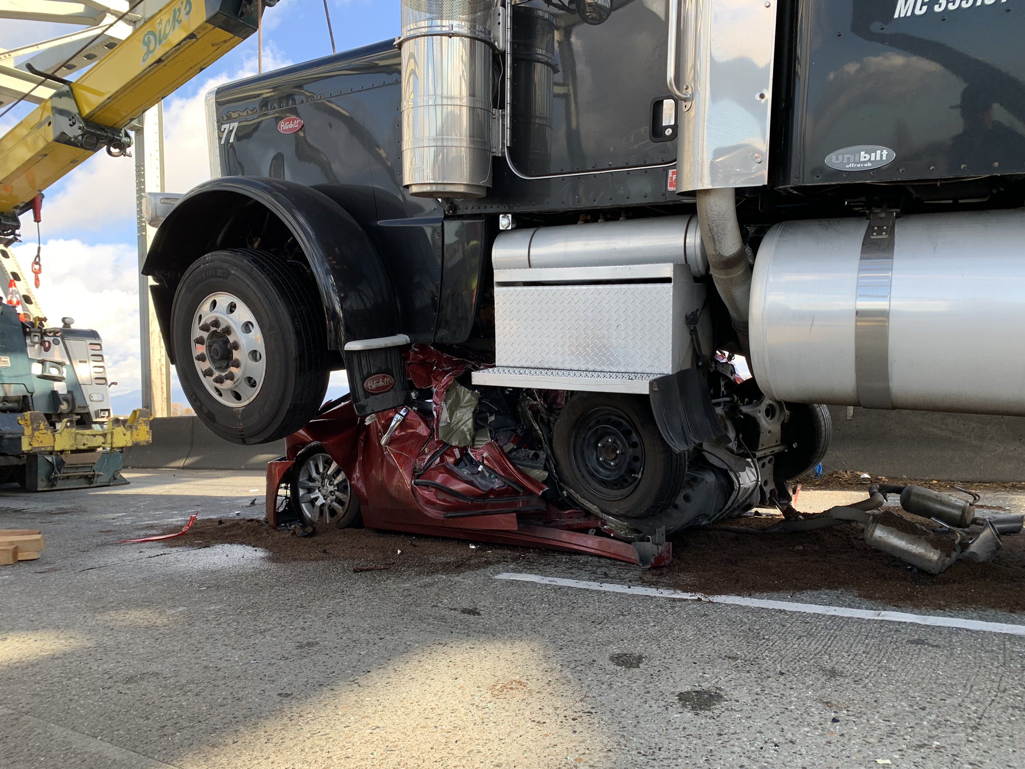 Car crumpled under semi-truck after crash in Washington – WFTV