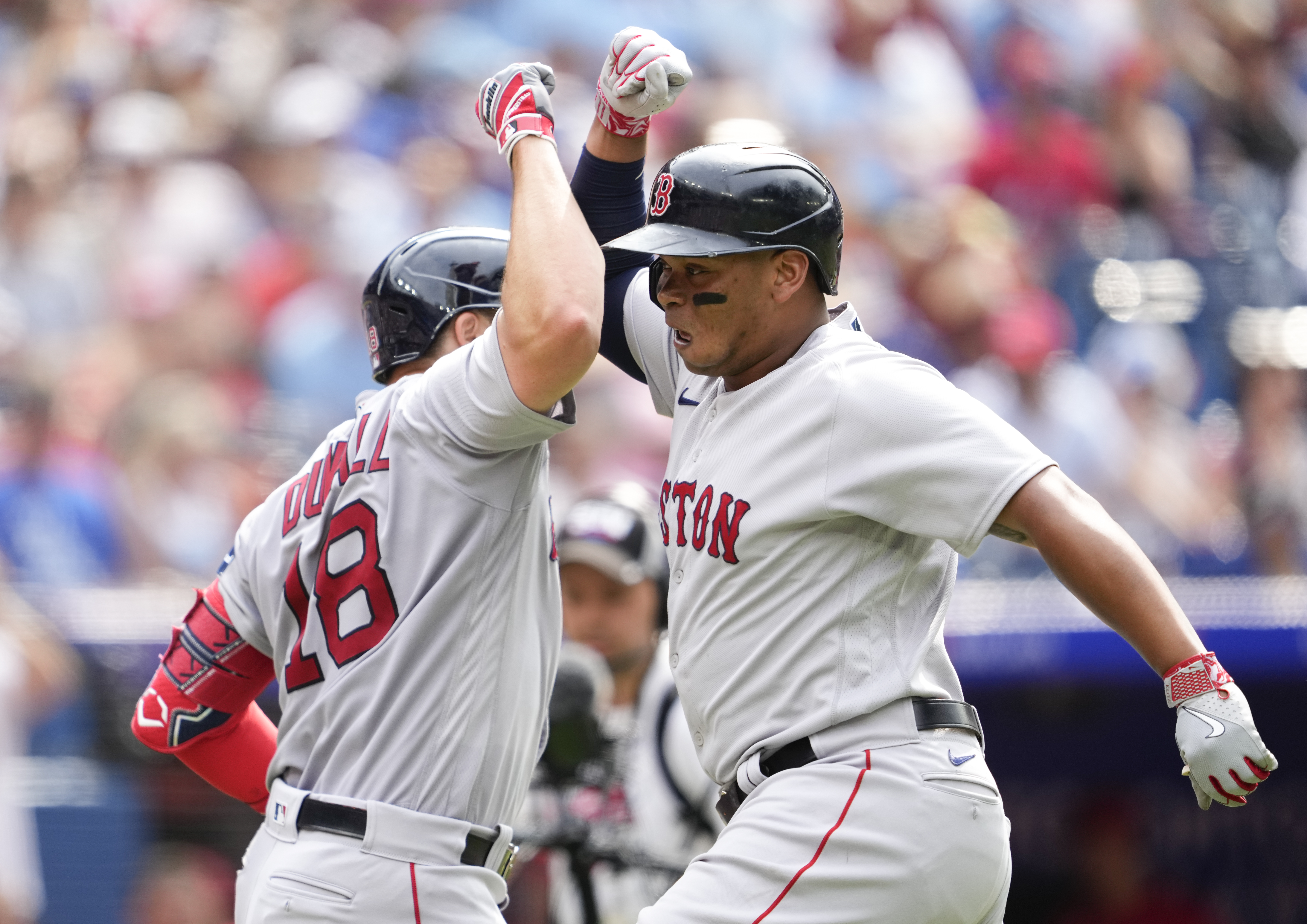 Boston Red Sox third baseman Rafael Devers celebrates his solo HR News  Photo - Getty Images