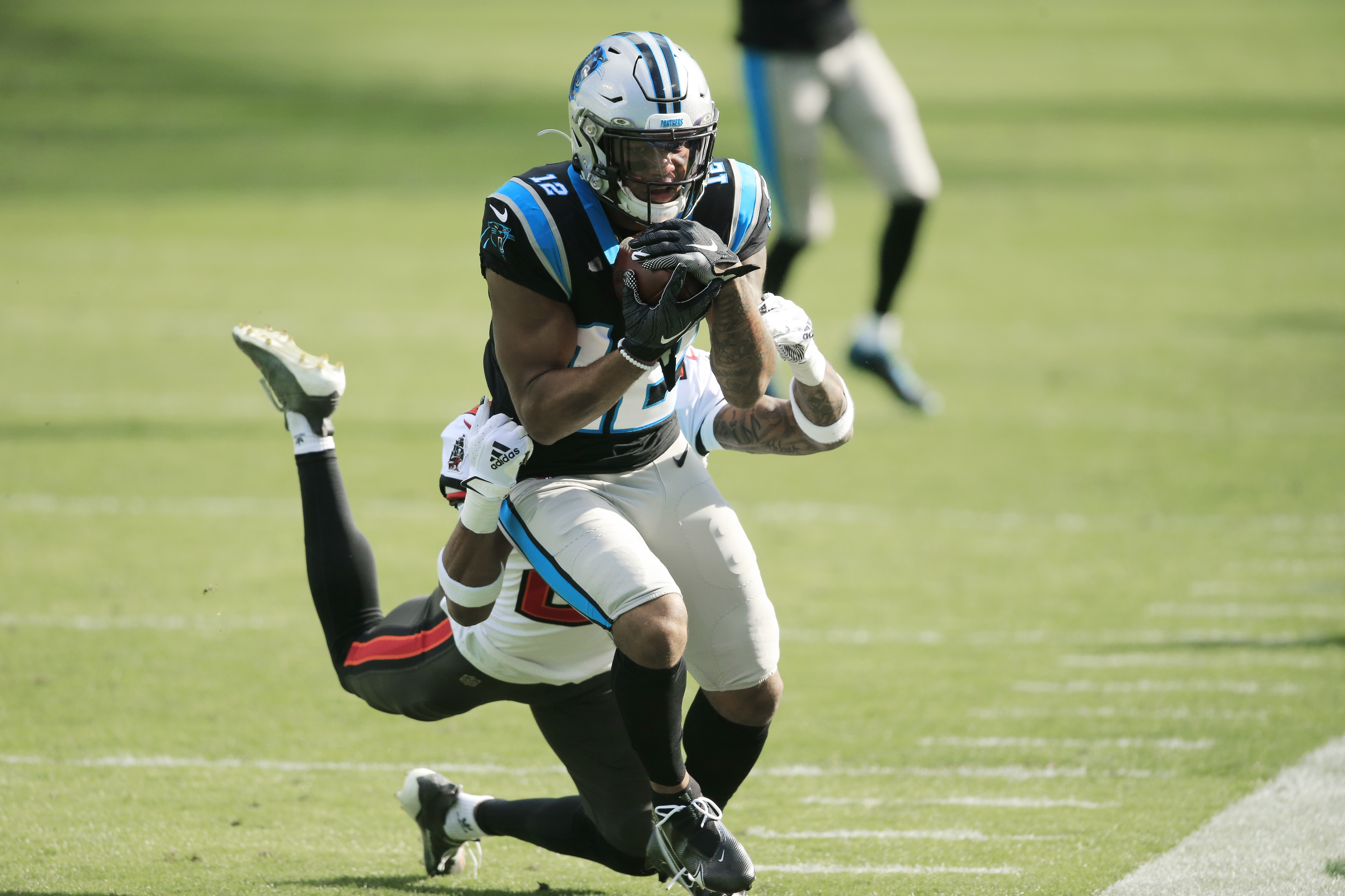 Carolina Panthers linebacker Shaq Thompson (7) reacts after making a play  on defense during an NFL football game against the Atlanta Falcons,  Thursday, Nov. 10 2022, in Charlotte, N.C. (AP Photo/Brian Westerholt