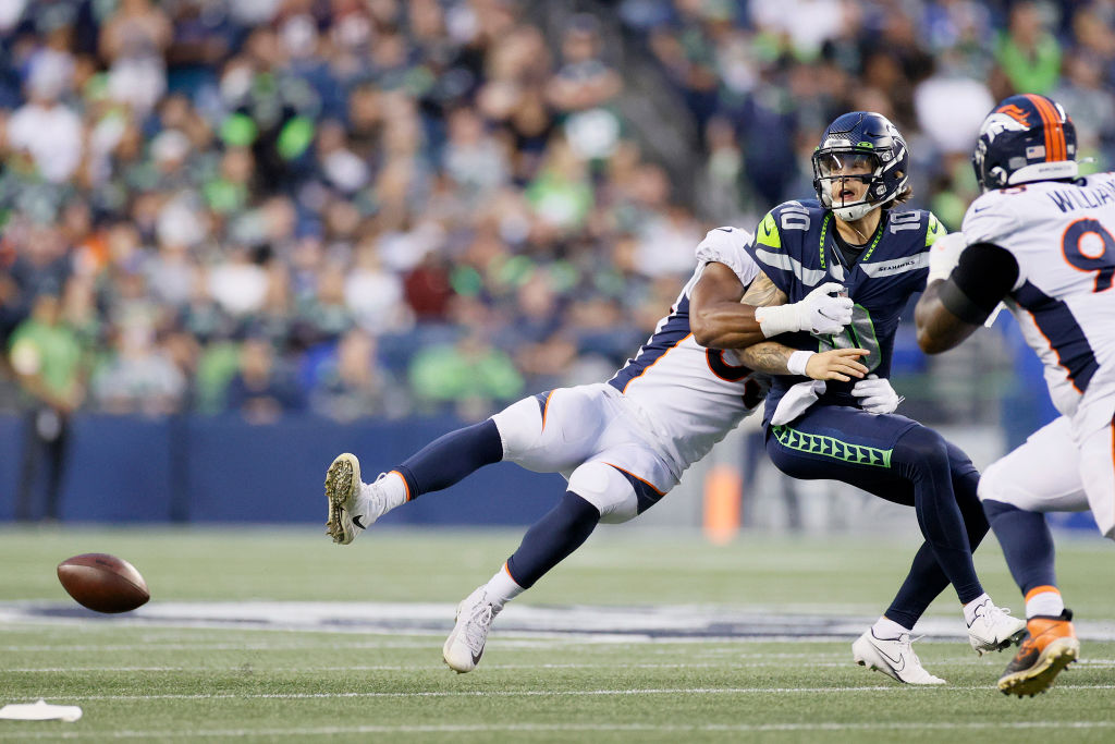 DK Metcalf Seattle Seahawks Unsigned Goes Up for Touchdown Catch Photograph