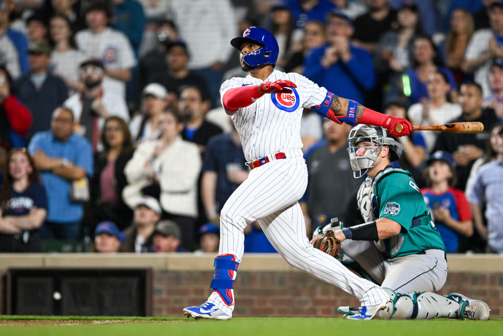 Velázquez hits grand slam as Cubs rally past Mariners 14-9