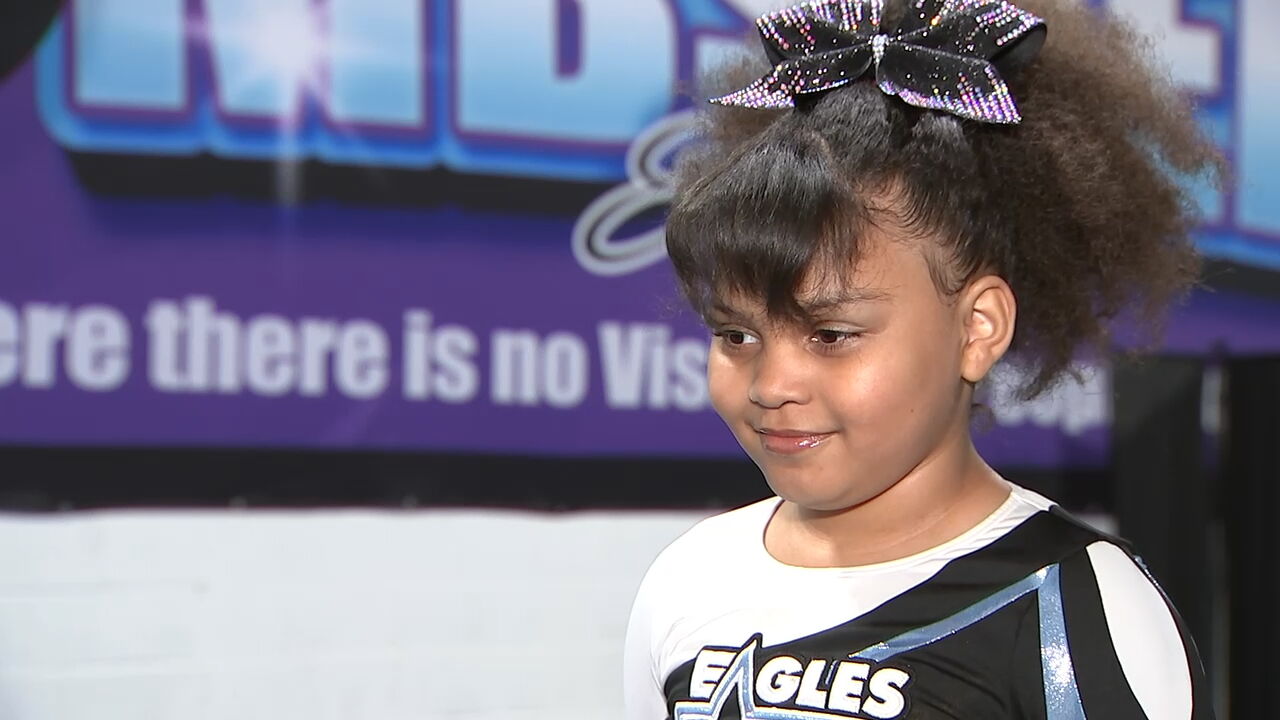 8-year-old cheerleader back on the mat 14 months after crash