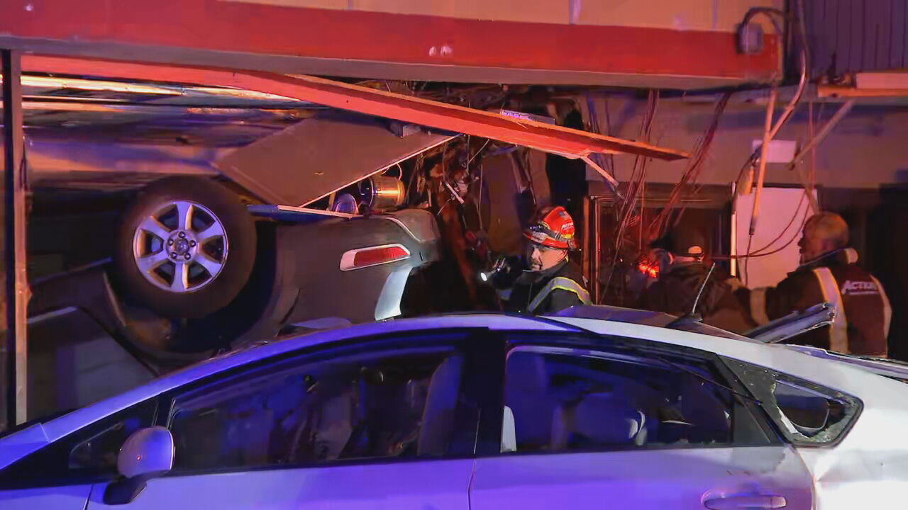 Car crashes through storefront in Saugus