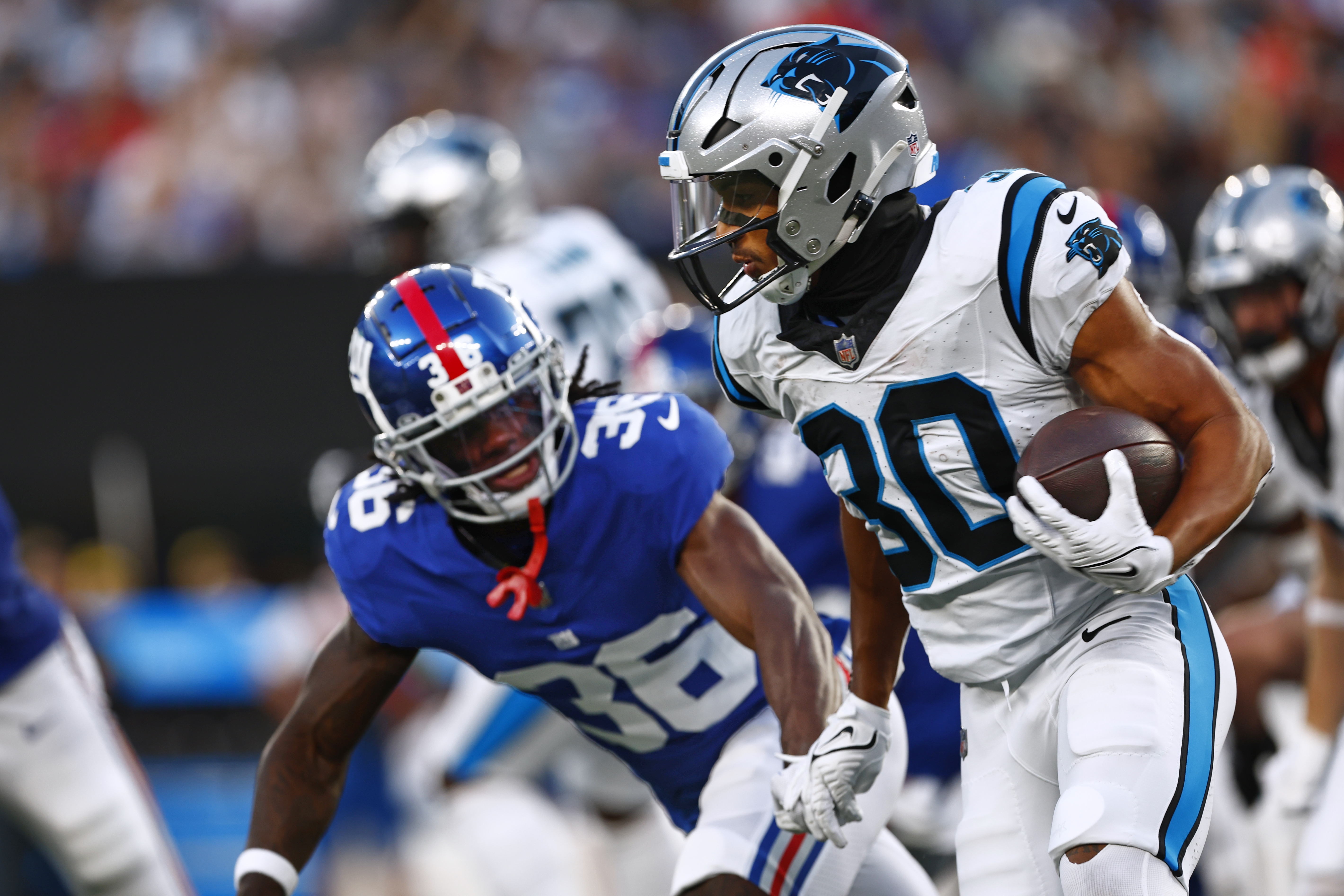 New York Giants' Saquon Barkley talks on this phone after an NFL football  game against the Carolina Panthers, Sunday, Sept. 18, 2022, in East  Rutherford, N.J. (AP Photo/Noah K. Murray Stock Photo 