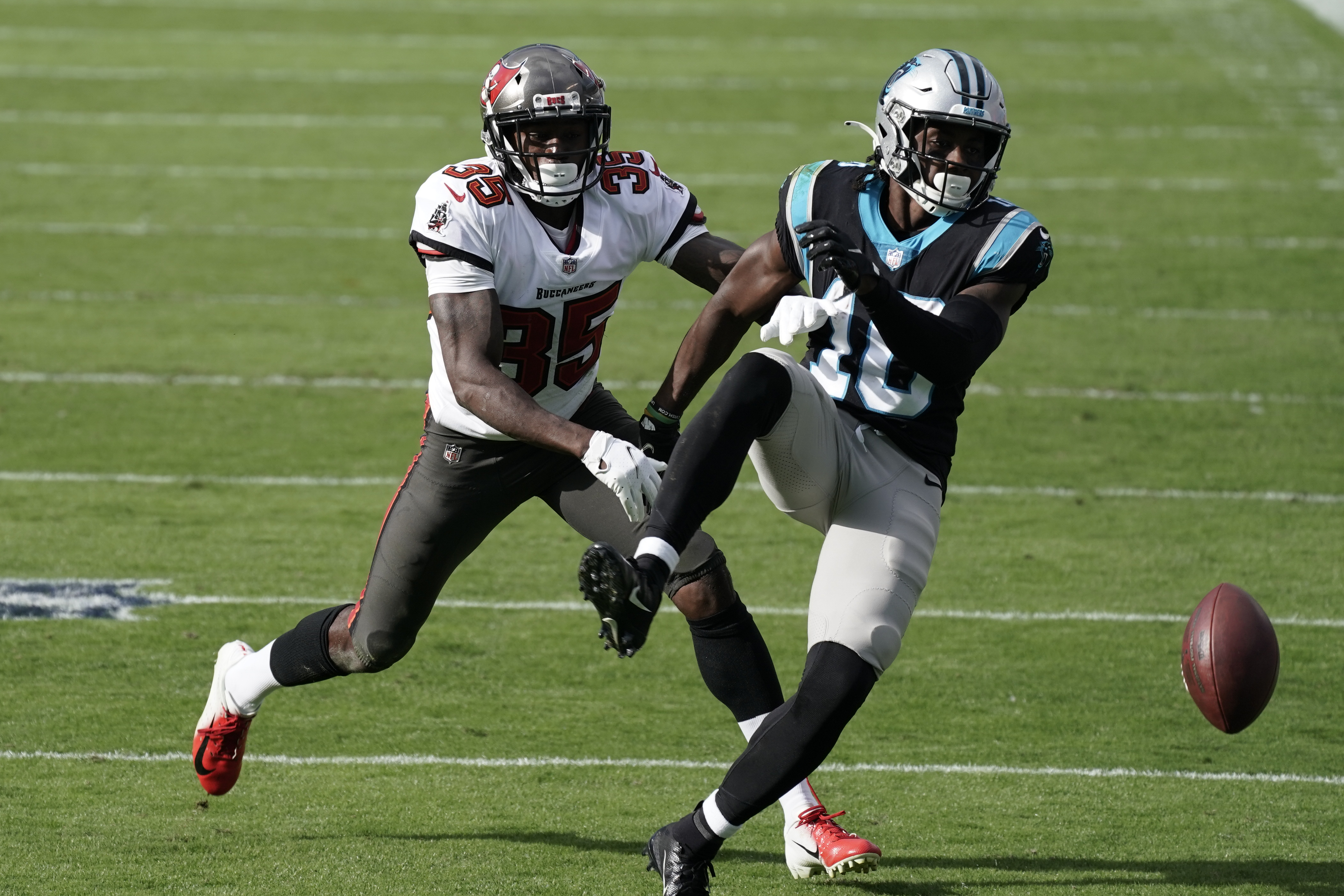 Carolina Panthers linebacker Shaq Thompson (7) reacts after making a play  on defense during an NFL football game against the Atlanta Falcons,  Thursday, Nov. 10 2022, in Charlotte, N.C. (AP Photo/Brian Westerholt