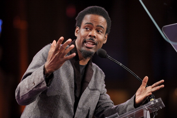 Chris Rock, wearing Detroit Tigers hat, appears on stage for first time  since Oscars slap