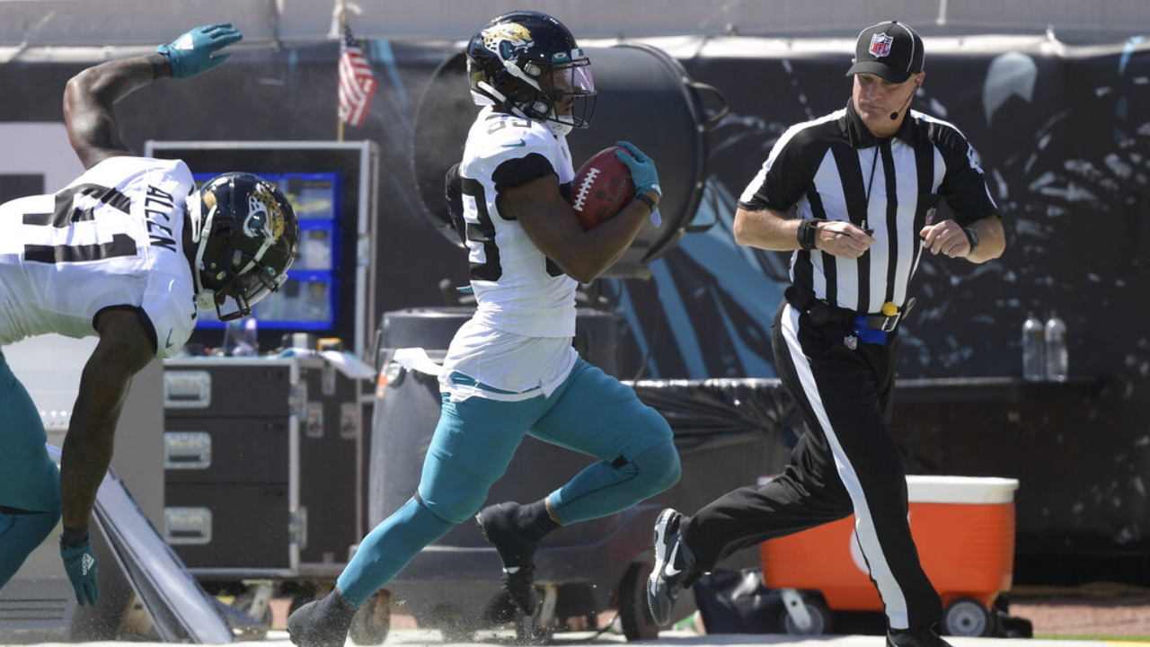 Jacksonville Jaguars wide receiver Jamal Agnew (39) returns a kickoff  against the Detroit Lions during the first half of an NFL football game,  Sunday, Dec. 4, 2022, in Detroit. (AP Photo/Duane Burleson