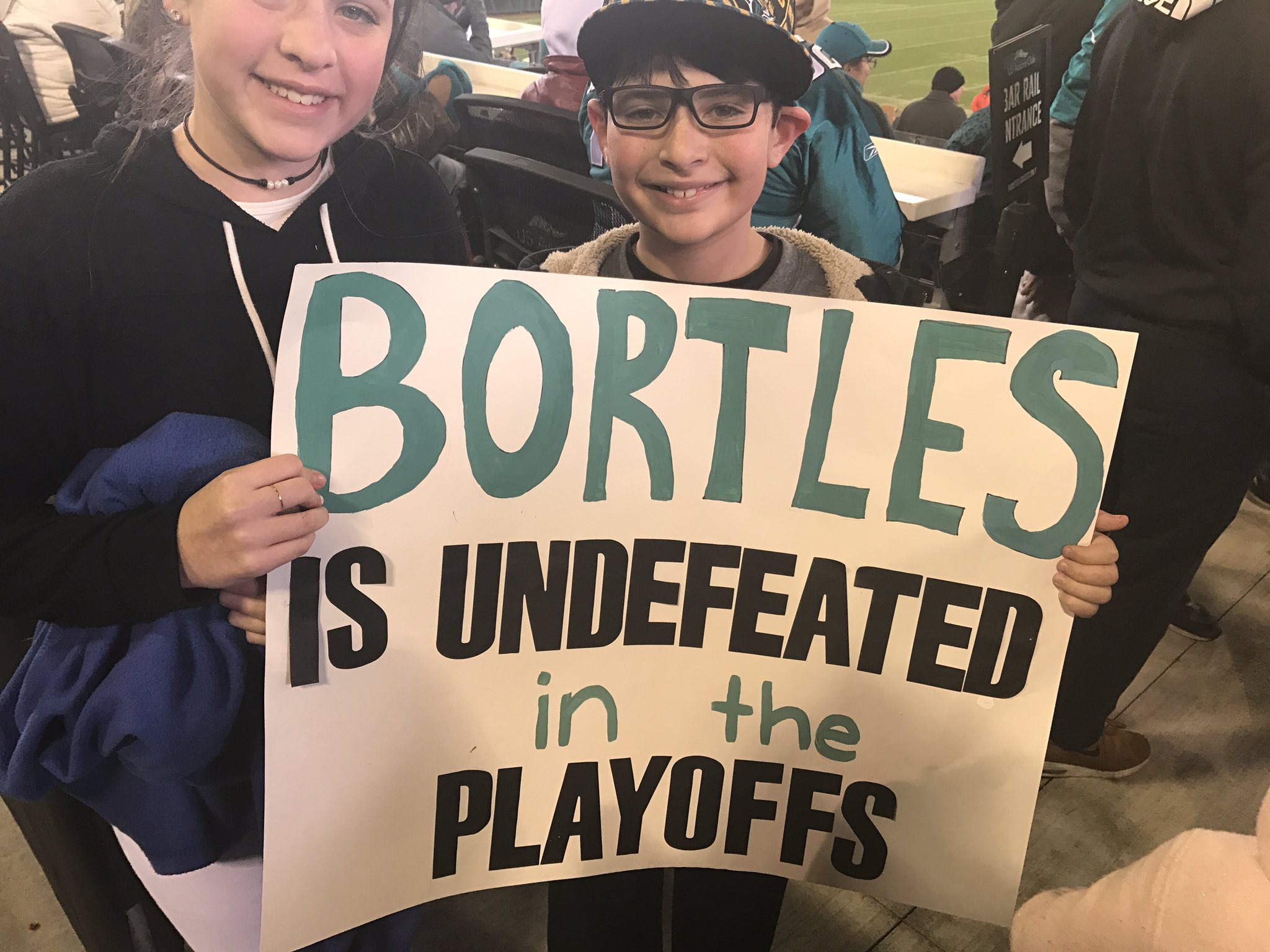 Photo: Jacksonville Jaguars fans celebrate a 45-42 win over the