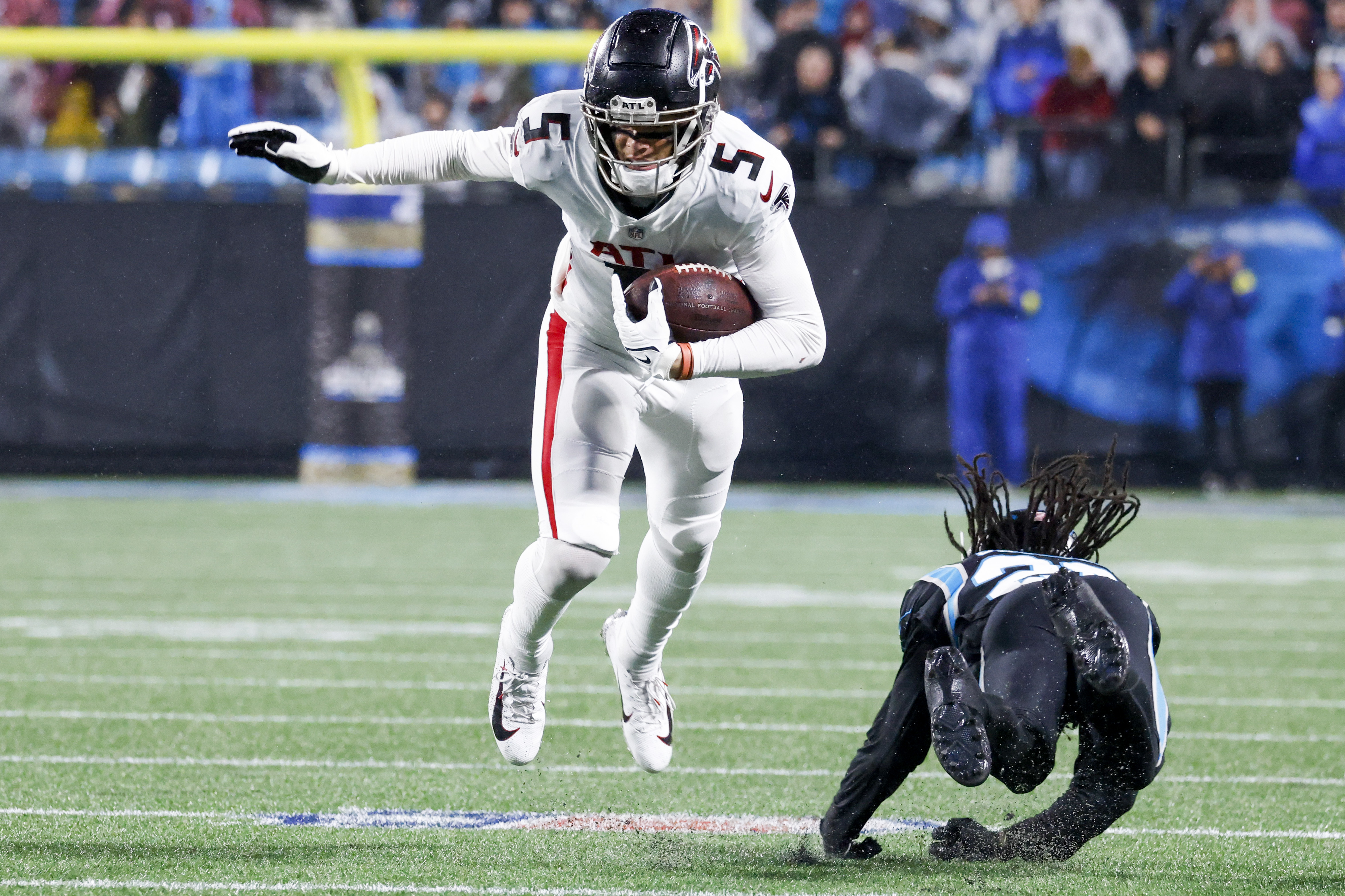 D'Onta Foreman leads Carolina Panthers past rival Atlanta Falcons in rain