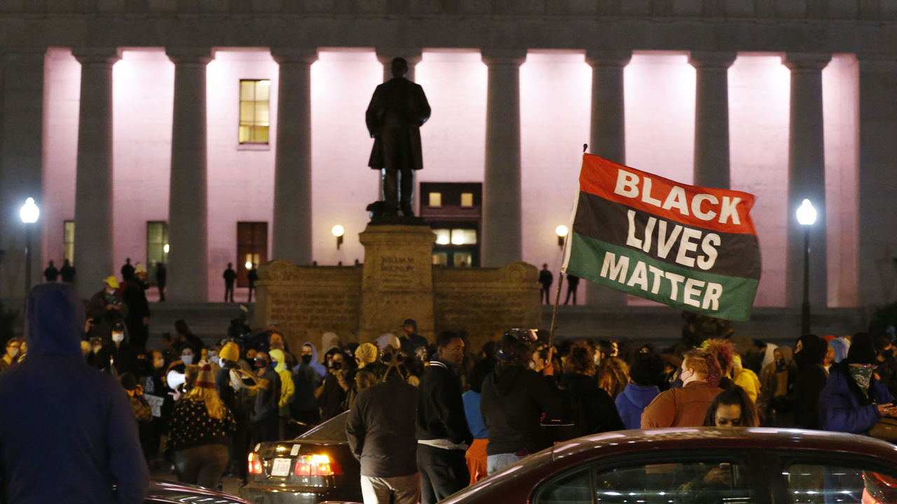 Photos: Protesters take to streets after police shoot ...