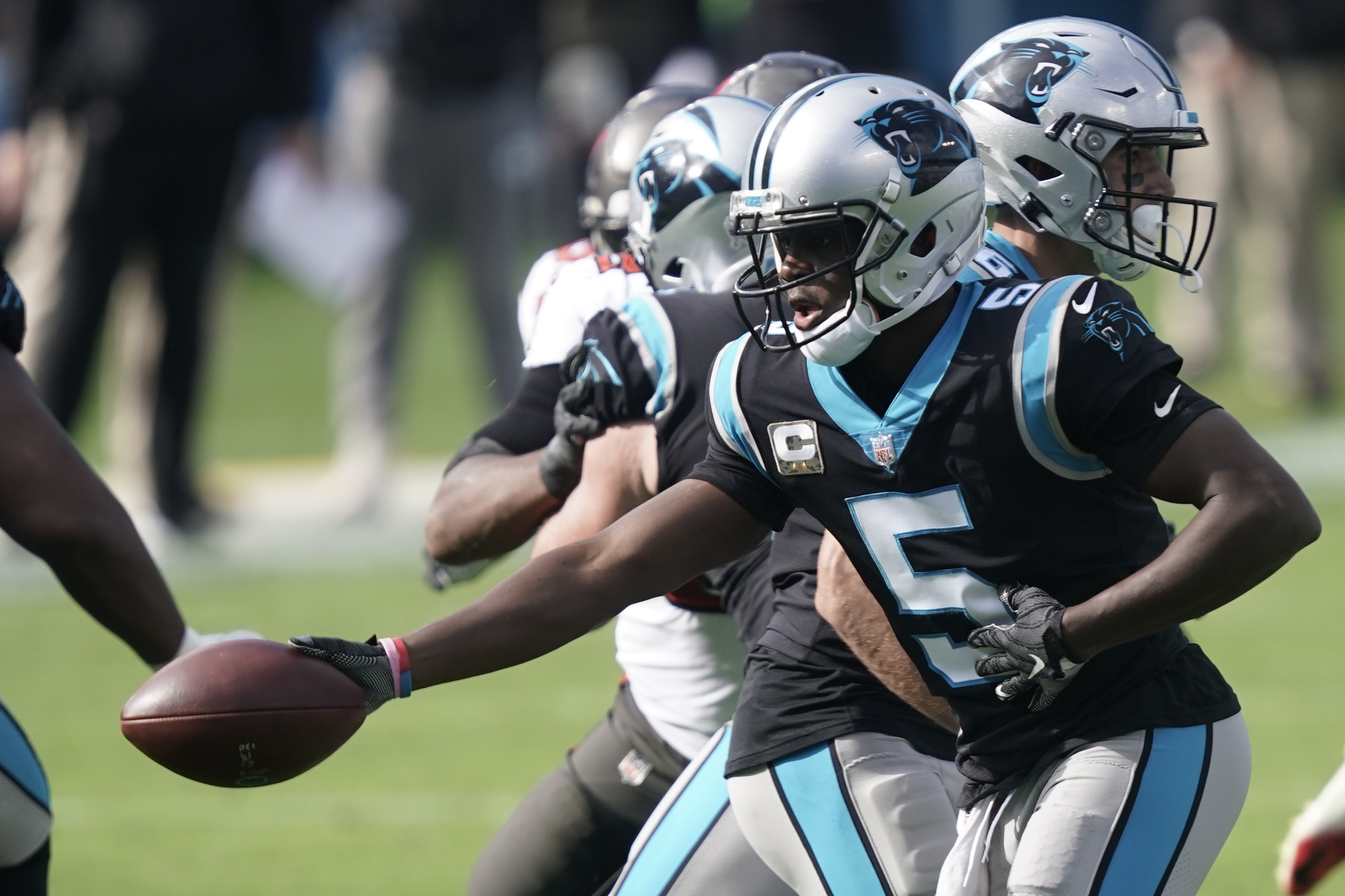 Carolina Panthers linebacker Shaq Thompson (7) reacts after making a play  on defense during an NFL football game against the Atlanta Falcons,  Thursday, Nov. 10 2022, in Charlotte, N.C. (AP Photo/Brian Westerholt