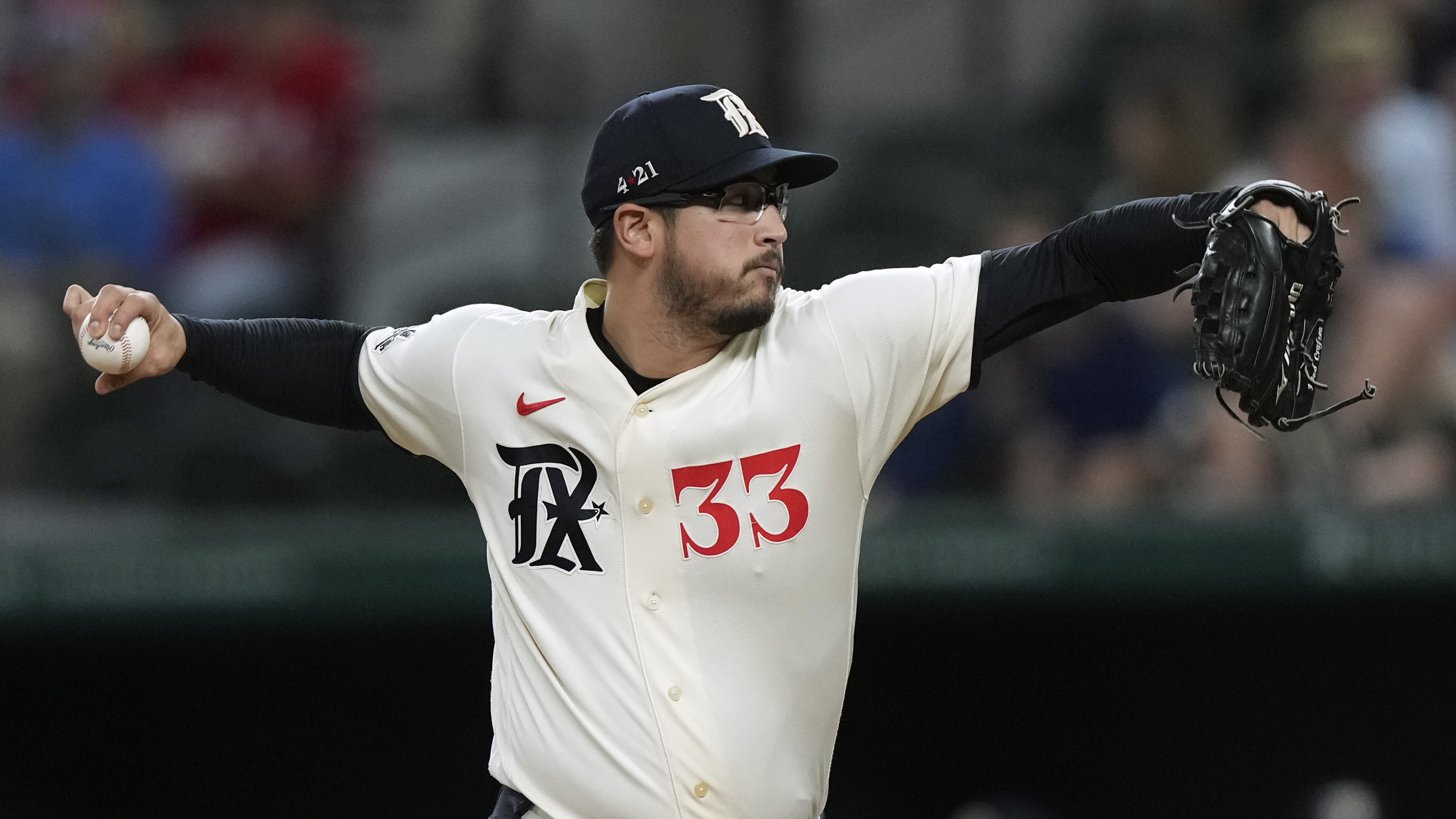 Rangers back on top of AL West after 8-5 win in opener over