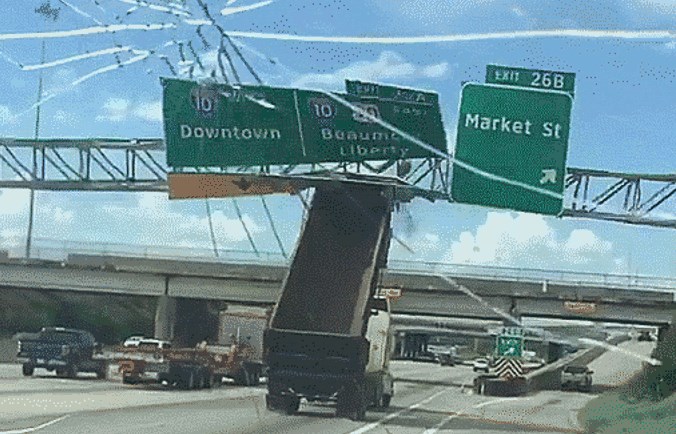 WATCH Dump truck takes out highway sign WDBO