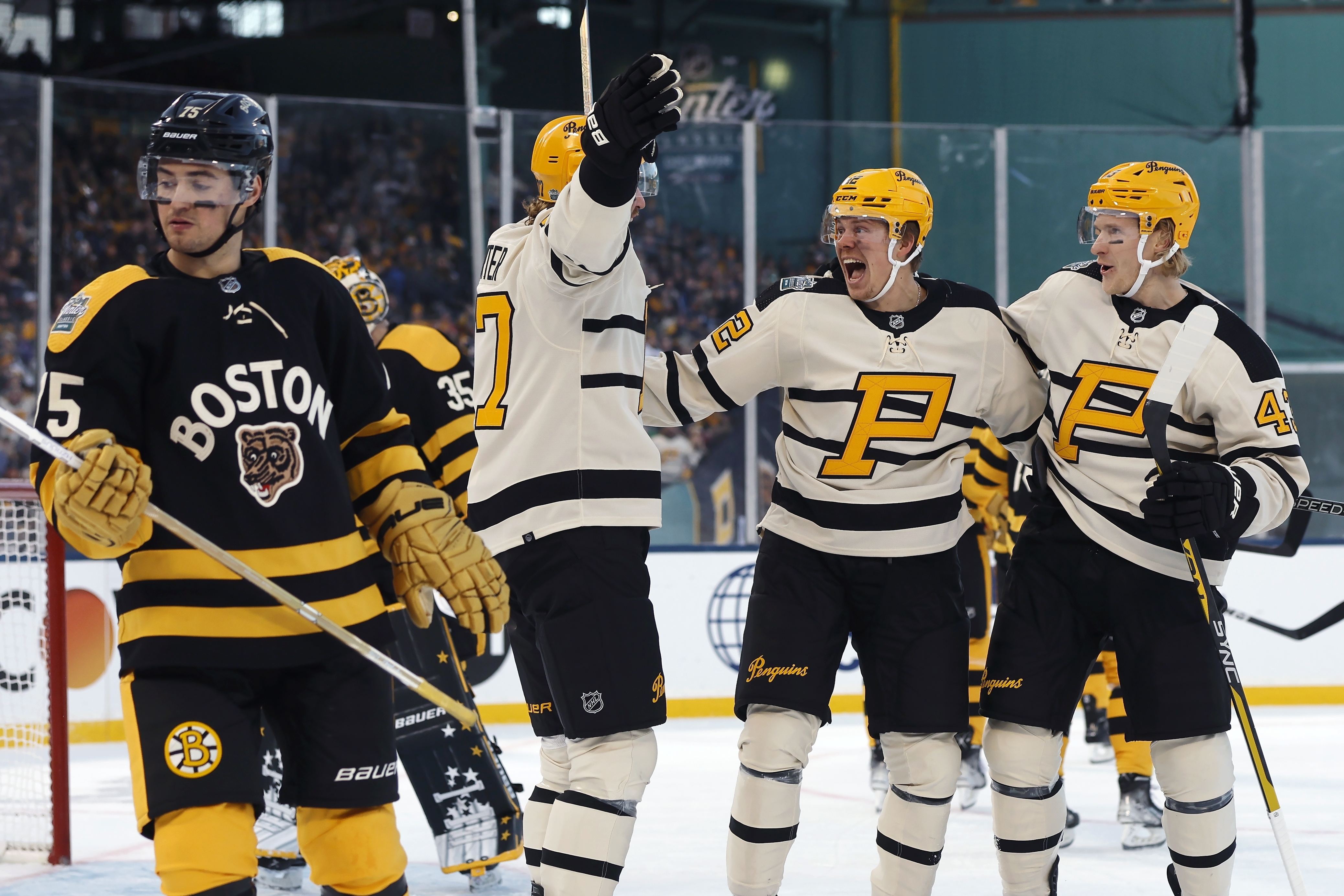 DeBrusk leads Bruins past Penguins in NHL's Winter Classic