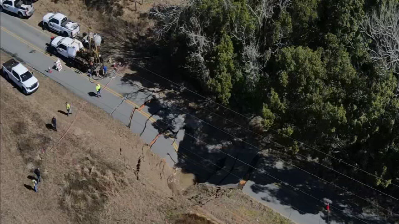 Depression collapses road in Lake County - WFTV