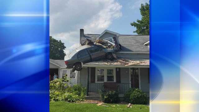 Vehicle crashes into 2nd story of Pa. home: 'There's a car on your