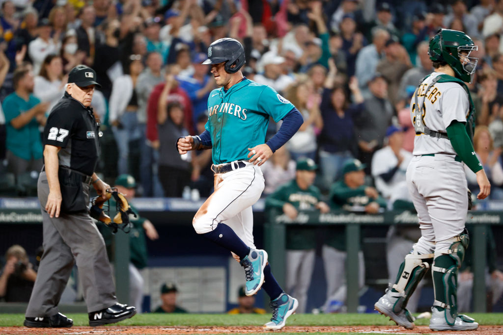 PHOTOS: Mariners clinch playoff spot after win over Athletics – KIRO 7 News  Seattle