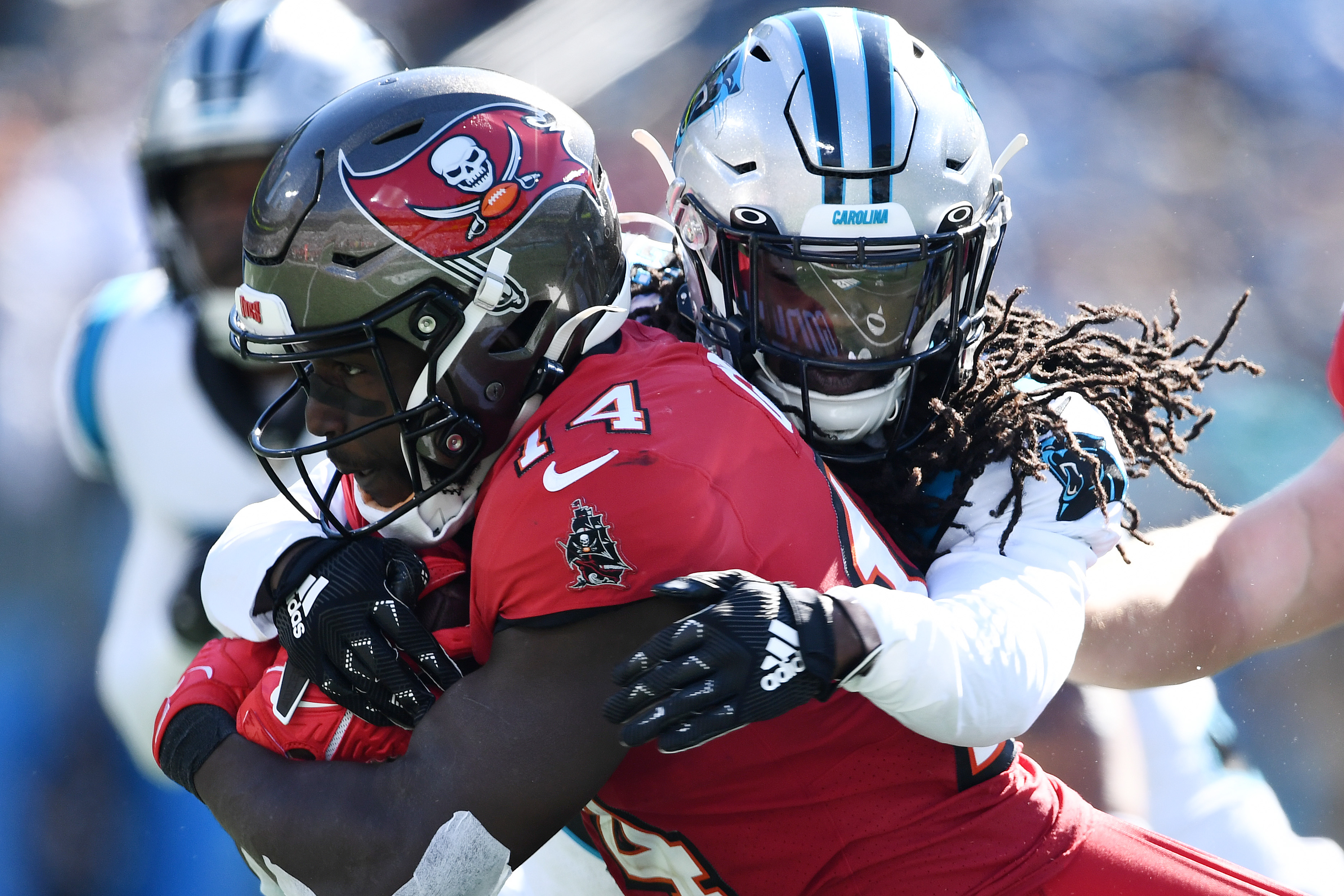 Carolina Panthers running back Chuba Hubbard (30) takes a handoff from  quarterback PJ Walker (11) during an NFL football game against the Tampa  Bay Buccaneers on Sunday, Oct. 23, 2022, in Charlotte