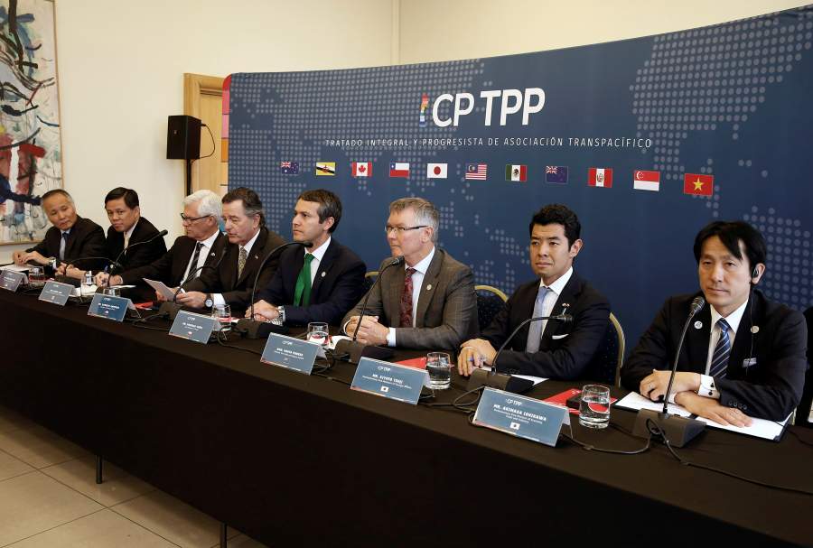 Representatives of the countries members of TPP trade deal, take part in a news conference at the Ministry of Foreign Affairs in Santiago