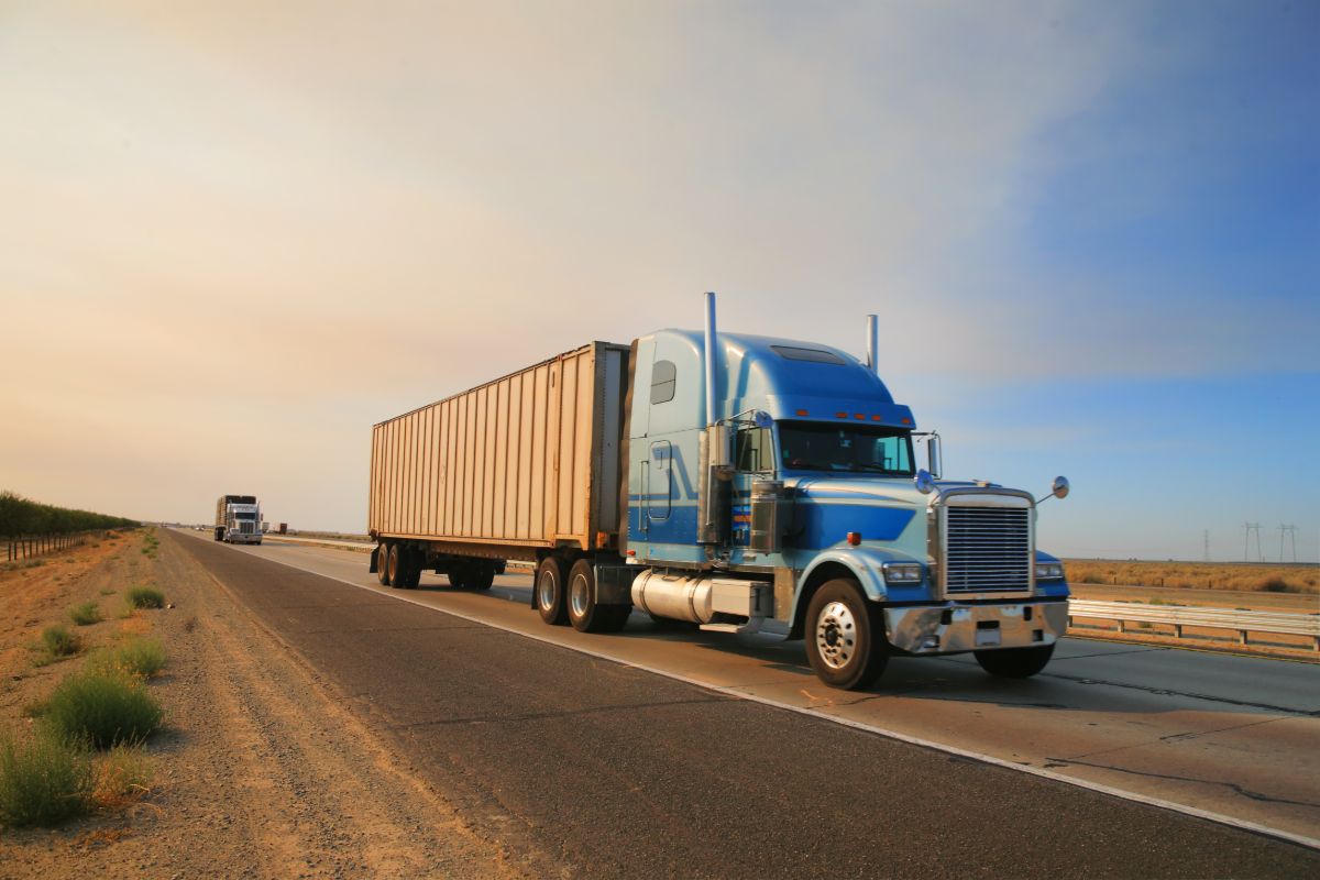 bigstock-Truck-on-freeway-12321044