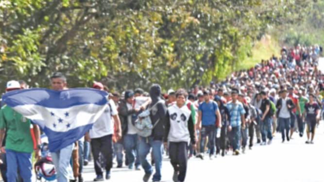 Caravana de migrantes rompe cerco en frontera de Guatemala La