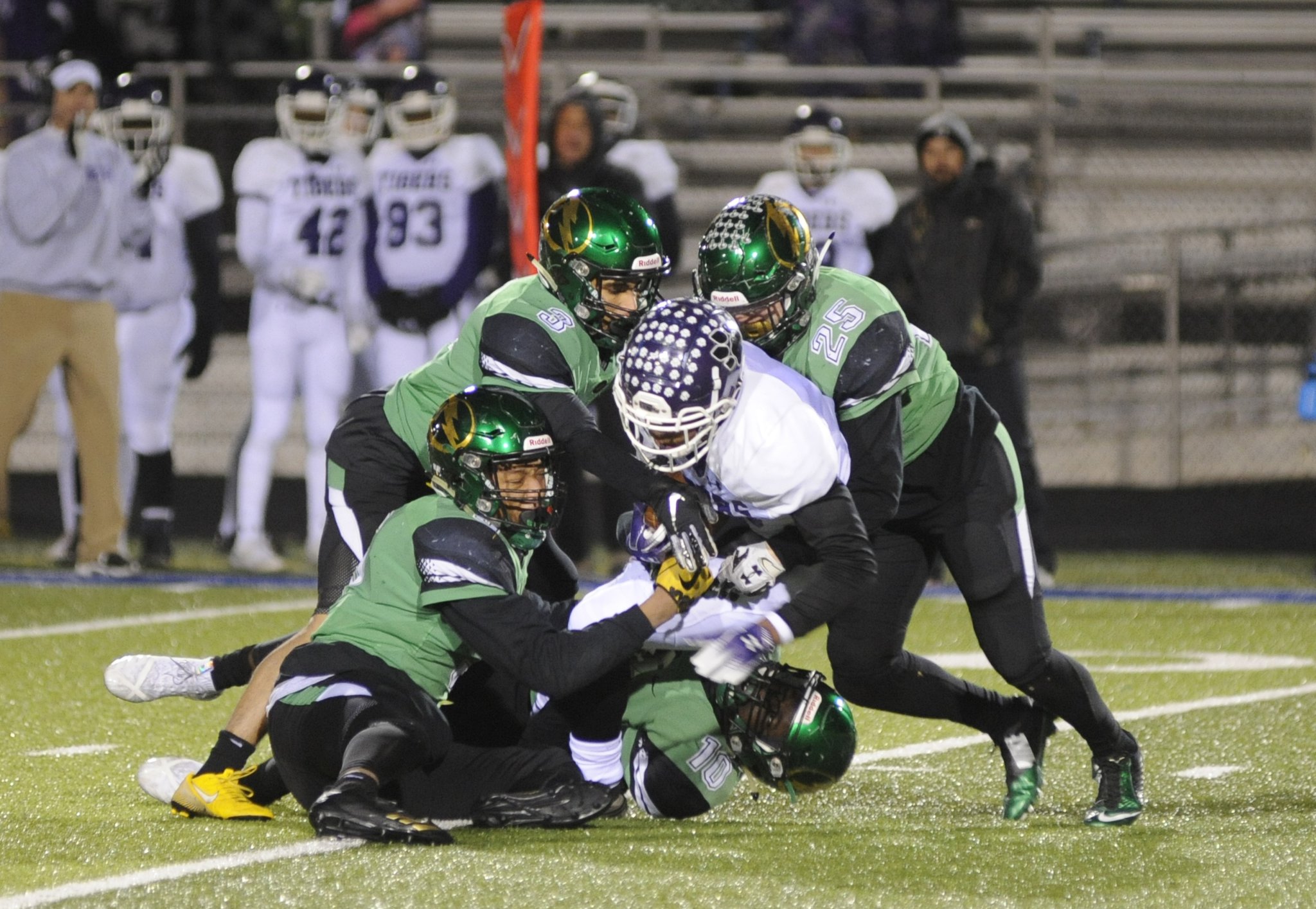 Northmont’s Jestin Jacobs (front left), Drake Hickman (3) and Aidan Reaman (25) make a stop. Pickerington Central defeated Northmont 33-7 in a D-I, Region 3 semifinal at Springfield s Evans Stadium on Friday, Nov. 9, 2018. MARC PENDLETON / STAFF