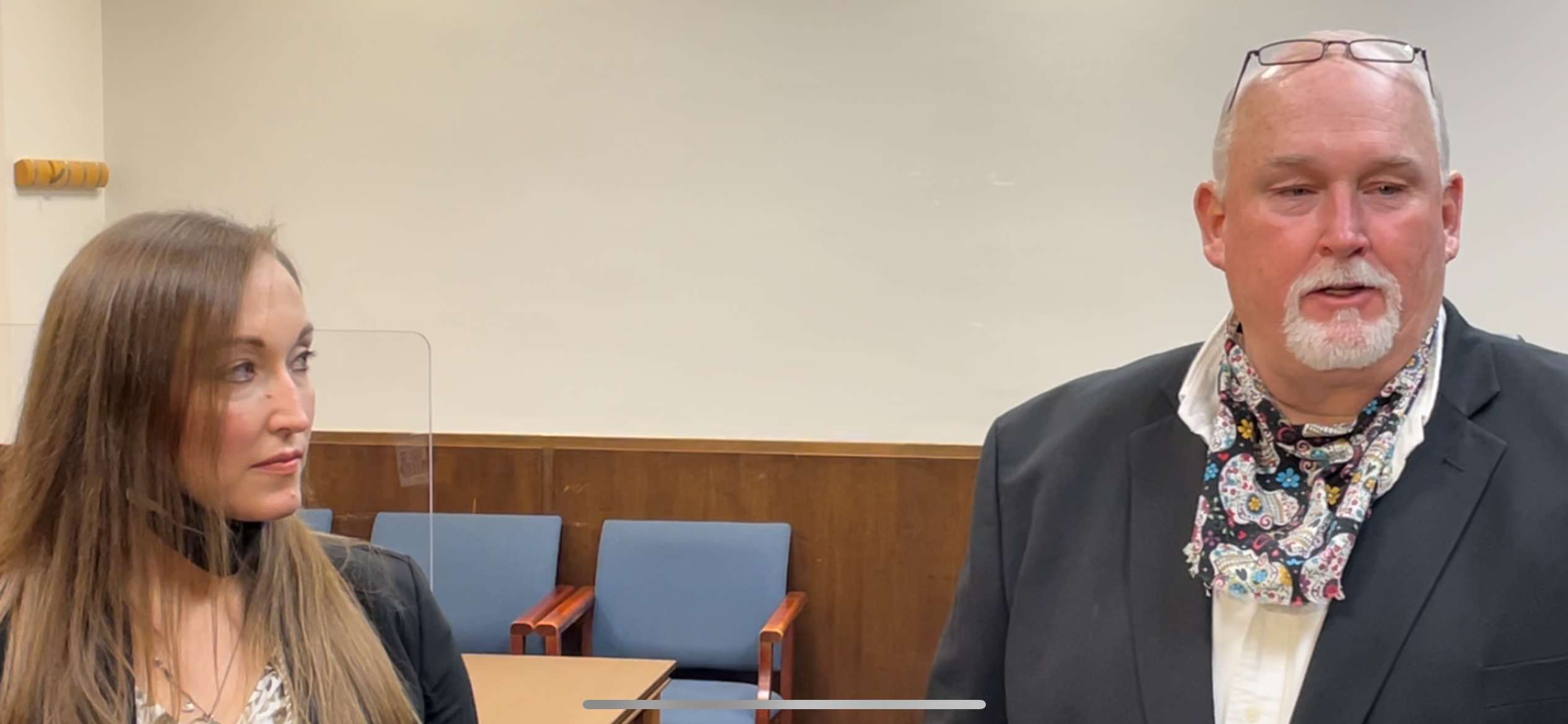 Attorney Michele Berry Godsey looks at Roger Dean Gillispie as he talks about his feelings after being declared a wrongfully imprisoned person.