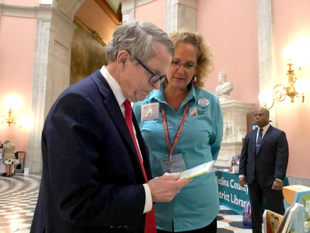 Diane Farrell talking with Gov. Mike DeWine about Dayton Metro Library's new third grade reading program during Legislative Day. CONTRIBUTED PHOTO