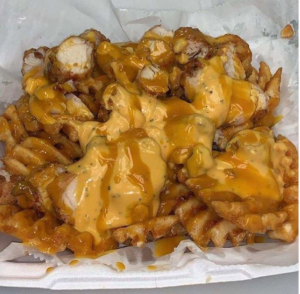 Chicken Spots' loaded fries comes with a list of sloppy toppings that can includes choice of two sauces, chopped chicken tenders, crispy bacon, shredded romaine lettuce, chopped tomatoes and pickled onions. Mac and cheese and greens can be added for $2 each.