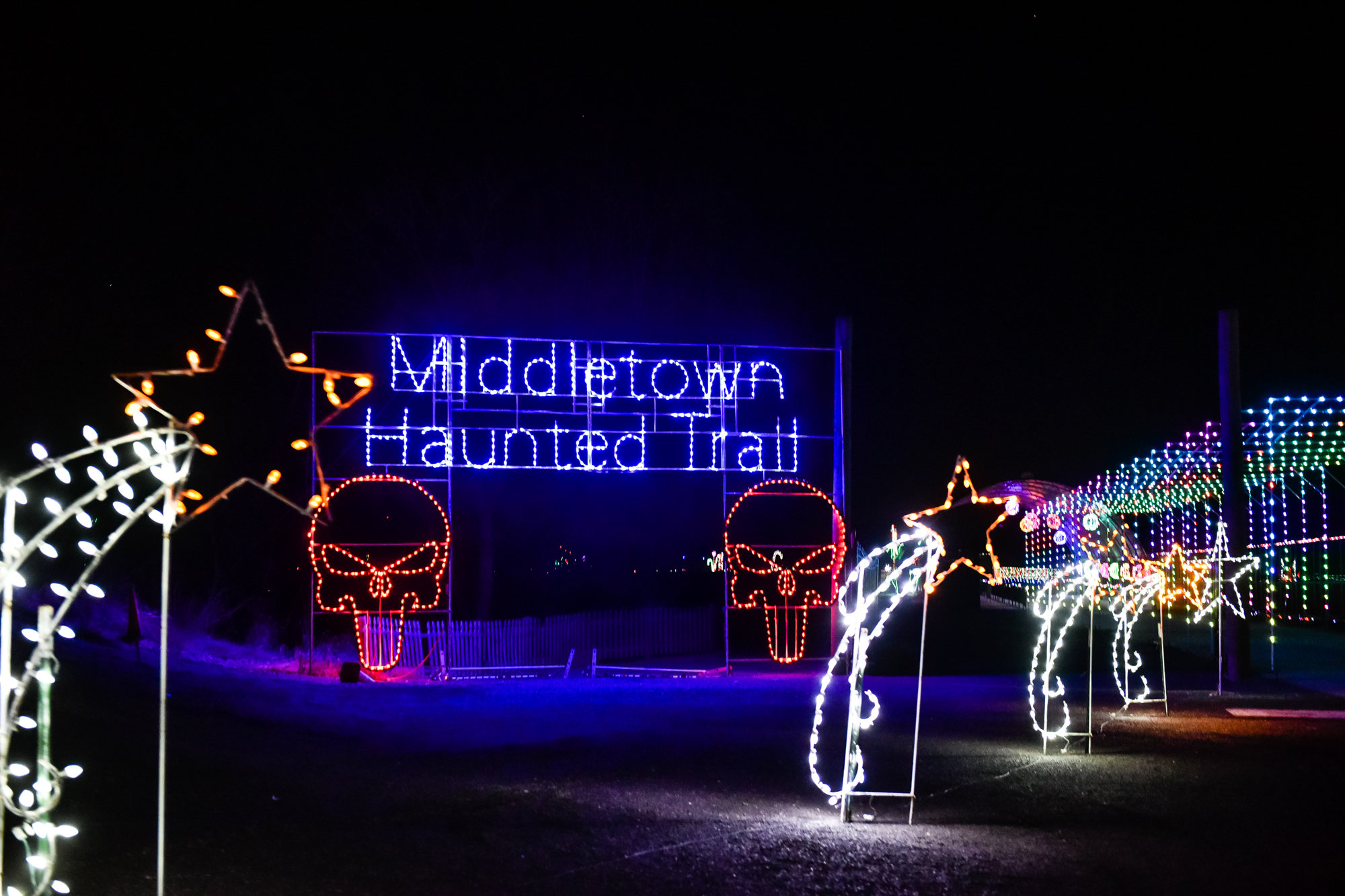 The Land of Illusion Christmas Glow on Thomas Road in Madison Township is open nightly through December with over 3.5 million lights in a 1.5 mile drive-through light display. Land of Illusion Scream Park is open during the Halloween season featuring Middletown Haunted Trail, Zombie Sniper Patrol and more. NICK GRAHAM/STAFF