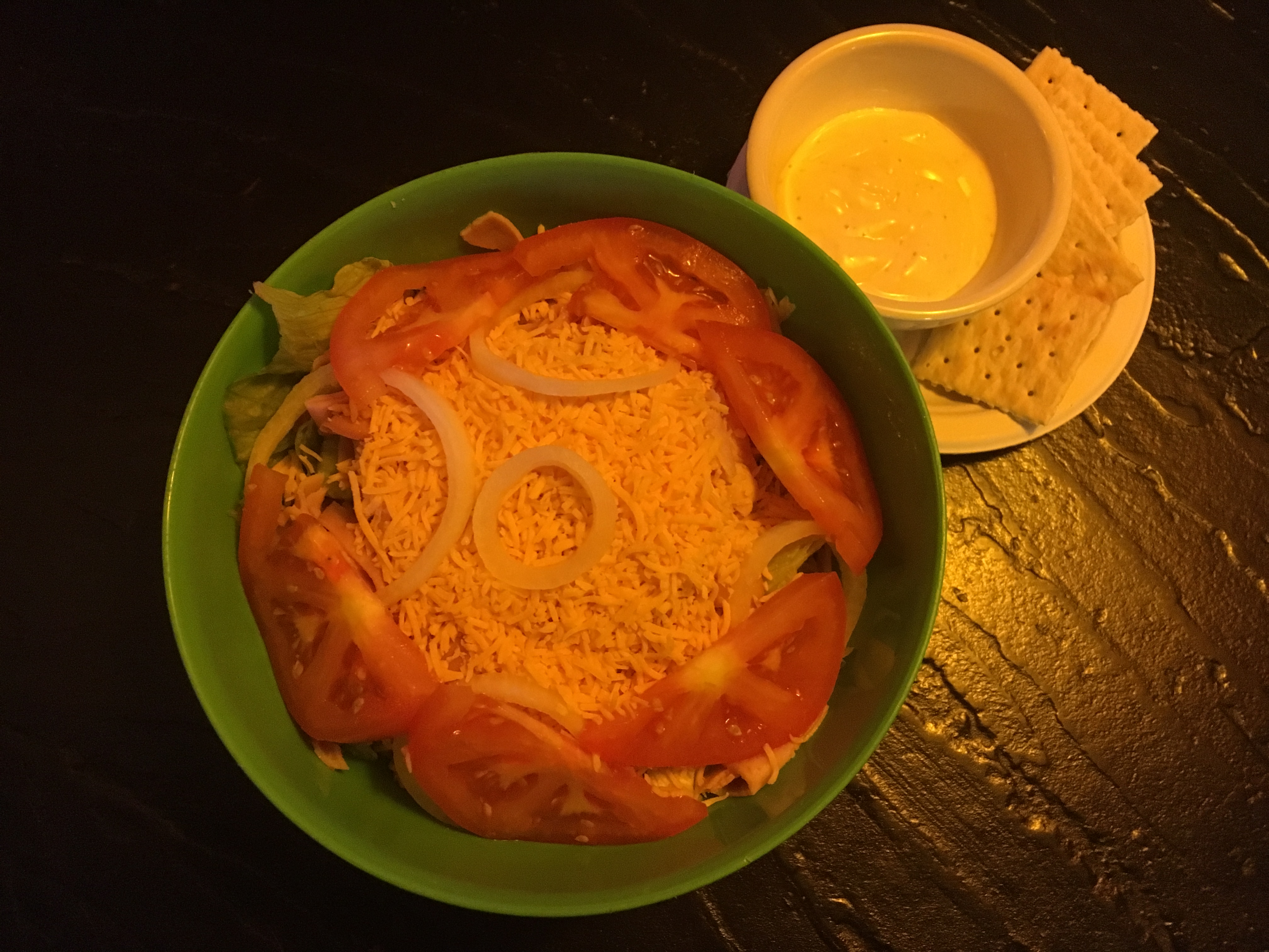 You might laugh at the idea of going to a bar for the salad, but you can wash it down with whatever you'd like regardless.
