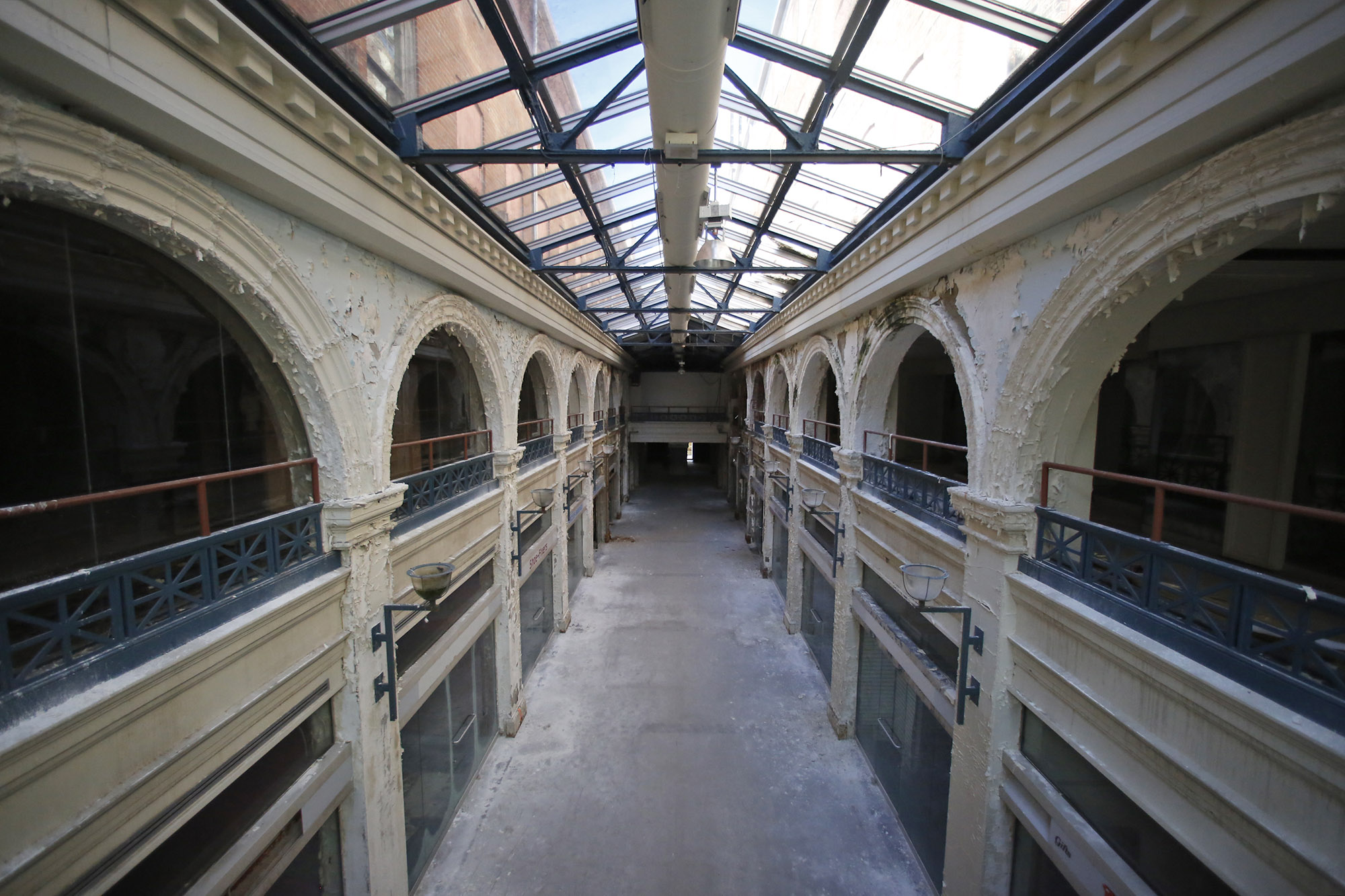 A two-story interior section of the Third Street Dayton Arcade. The city of Dayton Friday pulled a request for $1 million in Montgomery County ED/GE funding to redevelop the arcade — but another funding request is expected in the spring. TY GREENLEES / STAFF
