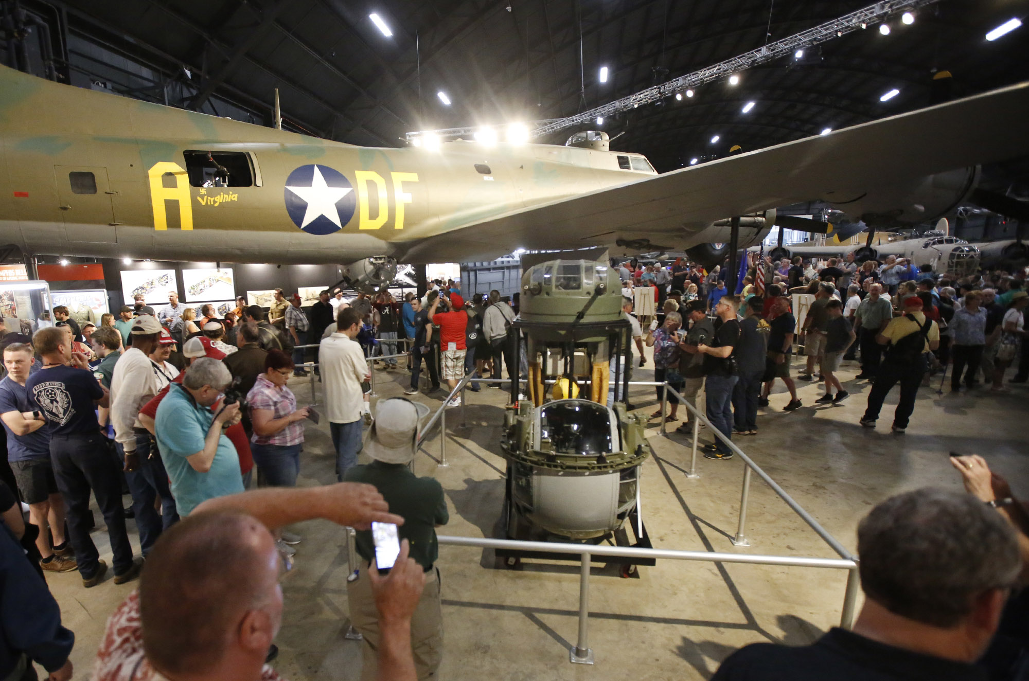 The National Museum of the U.S. Air Force opened the Memphis Belle exhibit to the public on Thursday after a 13-year restoration. Staff and volunteers worked 55,000 hours to restore the iconic World War II bomber. TY GREENLEES / STAFF